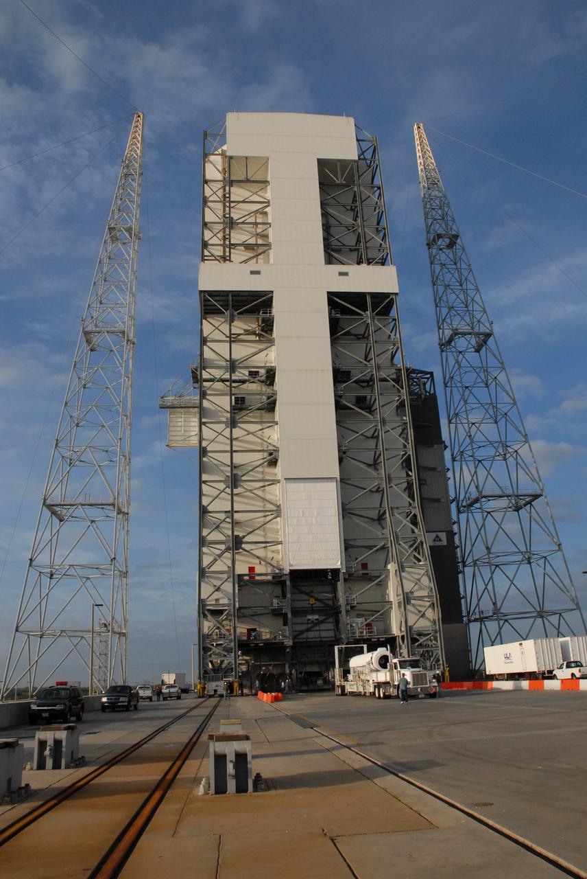 CAPE CANAVERAL, Fla. – The second of two solid rocket boosters rolls up to the mobile service tower on Launch Pad 37 at Cape Canaveral Air Force Station in Florida. The rocket will be installed on the right side of the Delta IV launch vehicle for the GOES-O spacecraft. GOES–O is one of a series of Geostationary Operational Environmental Satellites. The multi-mission GOES series N-P will be a vital contributor to weather, solar and space operations and science. NASA and the National Oceanic and Atmospheric Administration, or NOAA, are actively engaged in a cooperative program to expand the existing GOES system with the launch of the GOES N-P satellites. Launch of the GOES-O is targeted for no earlier than April 2009. Photo credit: NASA/Jack Pfaller