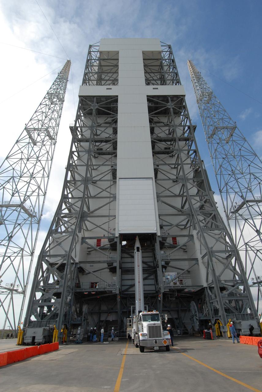 CAPE CANAVERAL, Fla. – On Launch Pad 37 at Cape Canaveral Air Force Station in Florida, the second of two solid rocket boosters is ready to be lifted into the mobile service tower and installed on the right side of the Delta IV launch vehicle for the GOES-O spacecraft. GOES–O is one of a series of Geostationary Operational Environmental Satellites. The multi-mission GOES series N-P will be a vital contributor to weather, solar and space operations and science. NASA and the National Oceanic and Atmospheric Administration, or NOAA, are actively engaged in a cooperative program to expand the existing GOES system with the launch of the GOES N-P satellites. Launch of the GOES-O is targeted for no earlier than April 2009. Photo credit: NASA/Jack Pfaller