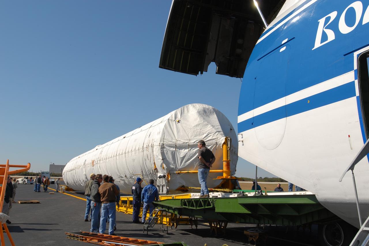 CAPE CANAVERAL, Fla. – On Cape Canaveral Air Force Station's skid strip in Florida, the shrouded Atlas V first stage booster has been moved out of the Russian AH-124-100 aircraft onto a transporter.  The Atlas V is the launch vehicle for NASA's Lunar Reconnaissance Orbiter, or LRO, and NASA's Lunar CRater Observation and Sensing Satellite, known as LCROSS. The booster will be taken to the Atlas Space Operations Center on CCAFS.Launch is scheduled no earlier than May 20. LCROSS and LRO are the first missions in NASA's plan to return humans to the moon and begin establishing a lunar outpost by 2020.   Photo credit: NASA/Jim Grossmann
