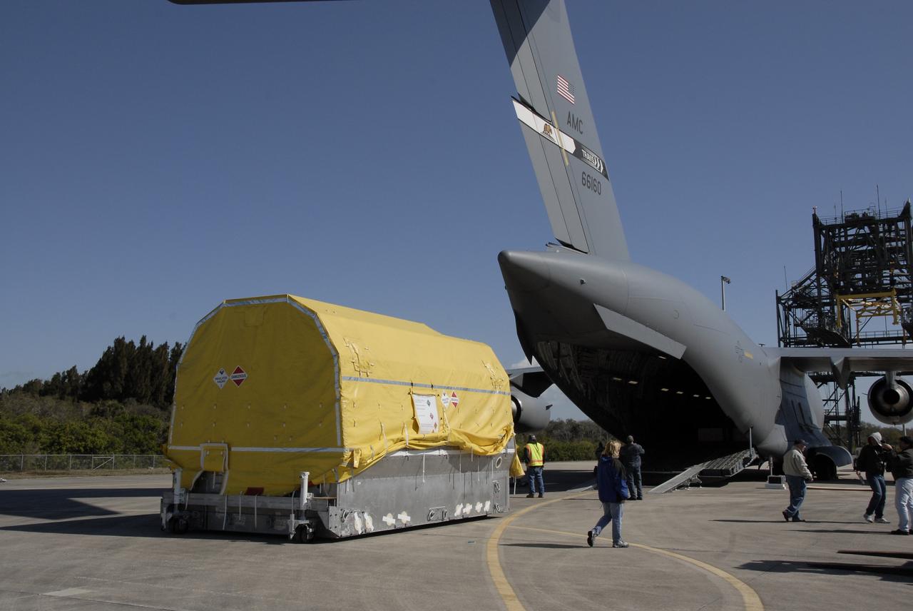 CAPE CANAVERAL, Fla. – The latest Geostationary Operational Environmental Satellite, or GOES, has been offloaded from a C-17 military cargo aircraft at the Shuttle Landing Facility at NASA's Kennedy Space Center  in Florida. The satellite will be moved to the Astrotech payload processing facility in Titusville, Fla. Developed by NASA for the National Oceanic and Atmospheric Administration, or NOAA, the GOES-O satellite is targeted to launch April 28 onboard a United Launch Alliance Delta IV expendable launch vehicle.  Photo credit: NASA/Kim Shiflett