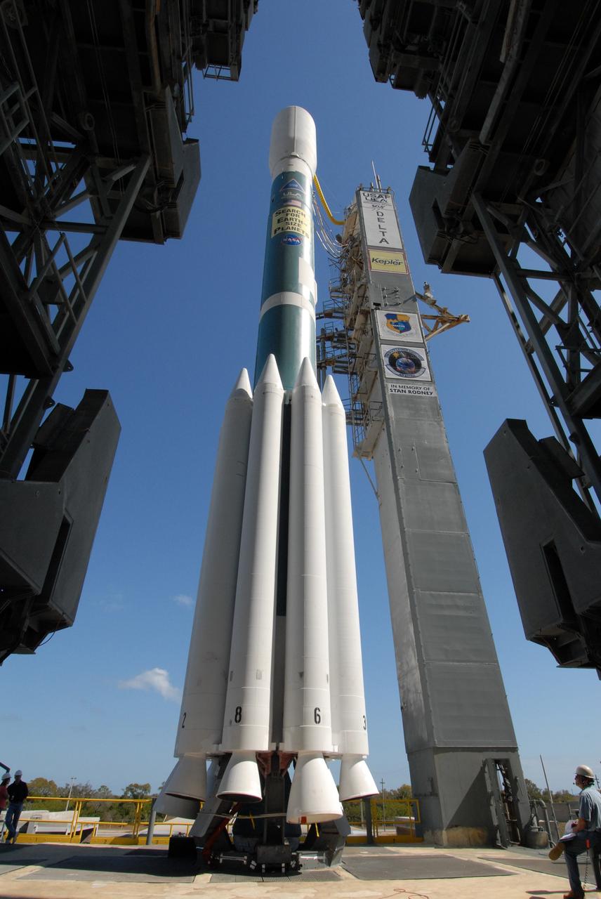 CAPE CANAVERAL, Fla. – The Delta II 7925 rocket stands ready for launch following rollback of the mobile service tower on Launch Pad 17-B at Cape Canaveral Air Force Station. Atop the rocket is NASA's Kepler spacecraft. Kepler is a spaceborne telescope designed to search the nearby region of our galaxy for Earth-size planets orbiting in the habitable zone of stars like our sun. The habitable zone is the region around a star where temperatures permit water to be liquid on a planet's surface. The challenge for Kepler is to look at a large number of stars in order to statistically estimate the total number of Earth-size planets orbiting sun-like stars in the habitable zone. Kepler will survey more than 100,000 stars in our galaxy. Photo credit: NASA/Jack Pfaller