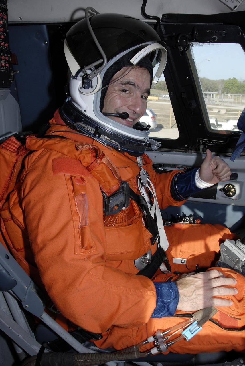 CAPE CANAVERAL, Fla. – On the Shuttle Landing Facility at NASA's Kennedy Space Center in Florida, STS-119 Commander Lee Archambault is seated in the Shuttle Training Aircraft to practice shuttle landings. The mission crew members arrived in the afternoon at Kennedy to prepare for launch. The mission is the 28th to the International Space Station and the 125th space shuttle flight.  Space shuttle Discovery will deliver the final pair of power-generating solar array wings and truss element, S6.  Photo credit: NASA/Kim Shiflett