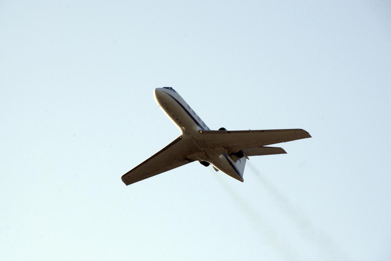 CAPE CANAVERAL, Fla. – One of the two Shuttle Training Aircraft flies over the Shuttle Landing Facility at NASA's Kennedy Space Center in Florida. STS-119 Commander Lee Archambault and Pilot Tony Antonelli are practicing shuttle landings on the SLF runway. The mission crew members arrived in the afternoon at Kennedy to prepare for launch. The mission is the 28th to the International Space Station and the 125th space shuttle flight. Space shuttle Discovery will deliver the final pair of power-generating solar array wings and truss element, S6. Photo credit: NASA/Kim Shiflett