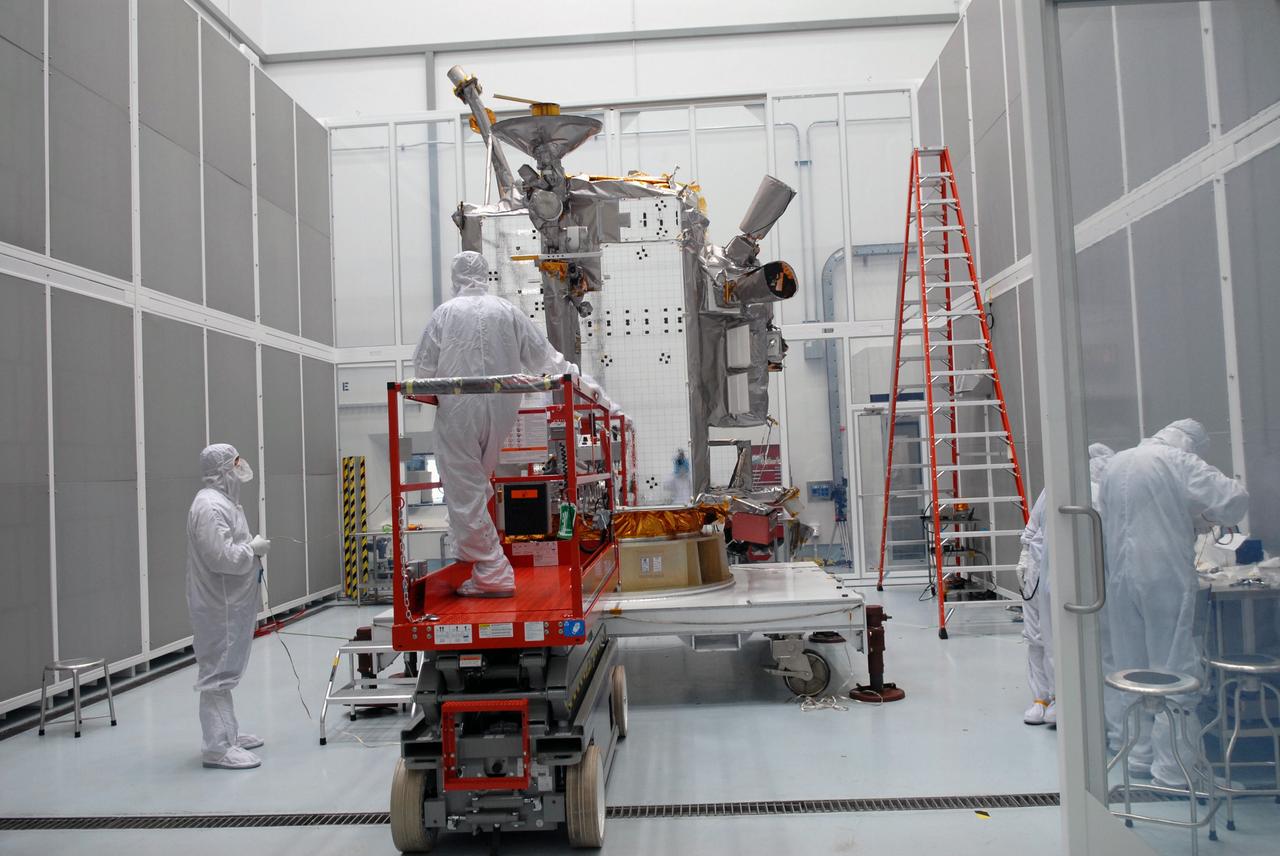 CAPE CANAVERAL, Fla. – At Astrotech in Titusville, Fla., NASA's Lunar Reconnaissance Orbiter, or LRO, spacecraft is being prepared for lifting to an Aronson table. The LRO will be rotated on the table to provide proper access for processing. The orbiter will carry seven instruments to provide scientists with detailed maps of the lunar surface and enhance our understanding of the moon's topography, lighting conditions, mineralogical composition and natural resources. Information gleaned from LRO will be used to select safe landing sites, determine locations for future lunar outposts and help mitigate radiation dangers to astronauts. The polar regions of the moon are the main focus of the mission because continuous access to sunlight may be possible and water ice may exist in permanently shadowed areas of the poles. Accompanying LRO on its journey to the moon will be the Lunar CRater Observation and Sensing Satellite, or LCROSS, a mission that will impact the lunar surface in its search for water ice. Launch of LRO is targeted for May 20.   Photo credit: NASA/Jack Pfaller