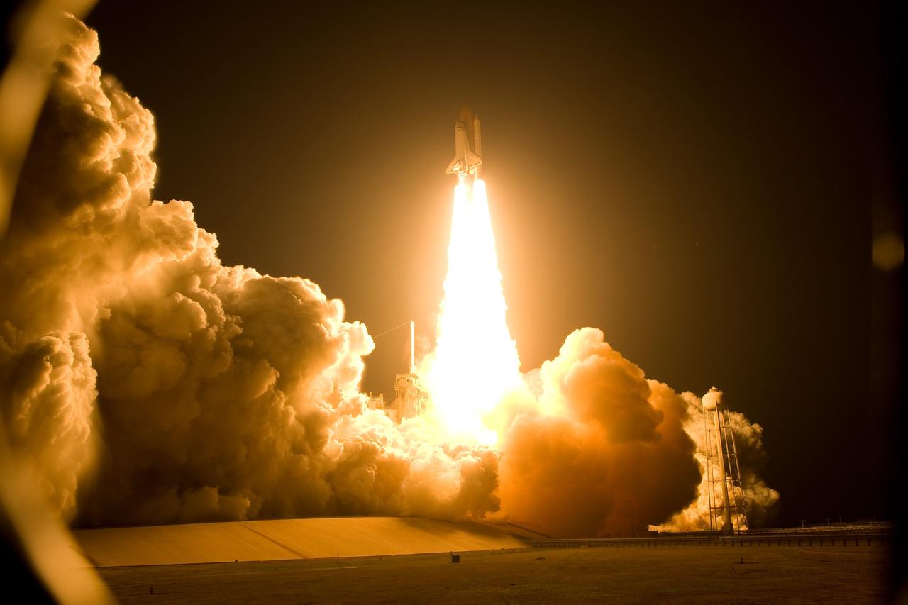 CAPE CANAVERAL, Fla. – Liftoff of space shuttle Discovery from Launch Pad 39A at NASA's Kennedy Space Center in Florida lights up the evening sky as it begins the STS-119 mission.  The launch was on time at 7:43 p.m. EDT. The STS-119 mission is the 28th to the International Space Station and the 125th space shuttle flight.  Discovery will deliver the final pair of power-generating solar array wings and the S6 truss segment.  Installation of S6 will signal the station's readiness to house a six-member crew for conducting increased science.  Photo credit: NASA/Sandra Joseph, Kevin O'Connell