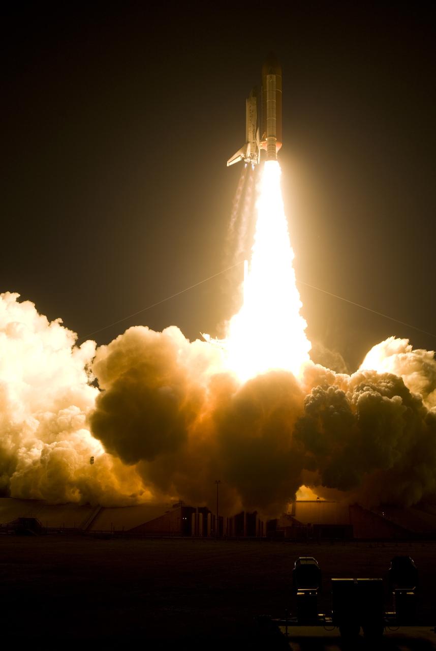 CAPE CANAVERAL, Fla. – Propelled by a column of fire, space shuttle Discovery races toward space on the STS-119 mission after liftoff from Launch Pad 39A at NASA's Kennedy Space Center in Florida.  Launch was on time at 7:43 p.m. EDT. The STS-119 mission is the 28th to the International Space Station and the 125th space shuttle flight.  Discovery will deliver the final pair of power-generating solar array wings and the S6 truss segment.  Installation of S6 will signal the station's readiness to house a six-member crew for conducting increased science.  Photo courtesy of Scott Andrews