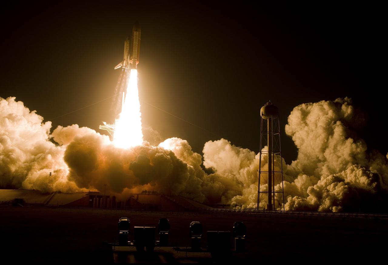CAPE CANAVERAL, Fla. – Clouds of smoke and steam roll across Launch Pad 39A at NASA's Kennedy Space Center in Florida as space shuttle Discovery races toward space on mission STS-119.  Launch was on time at 7:43 p.m. EDT. The STS-119 mission is the 28th to the International Space Station and the 125th space shuttle flight.  Discovery will deliver the final pair of power-generating solar array wings and the S6 truss segment.  Installation of S6 will signal the station's readiness to house a six-member crew for conducting increased science.  Photo courtesy of Scott Andrews