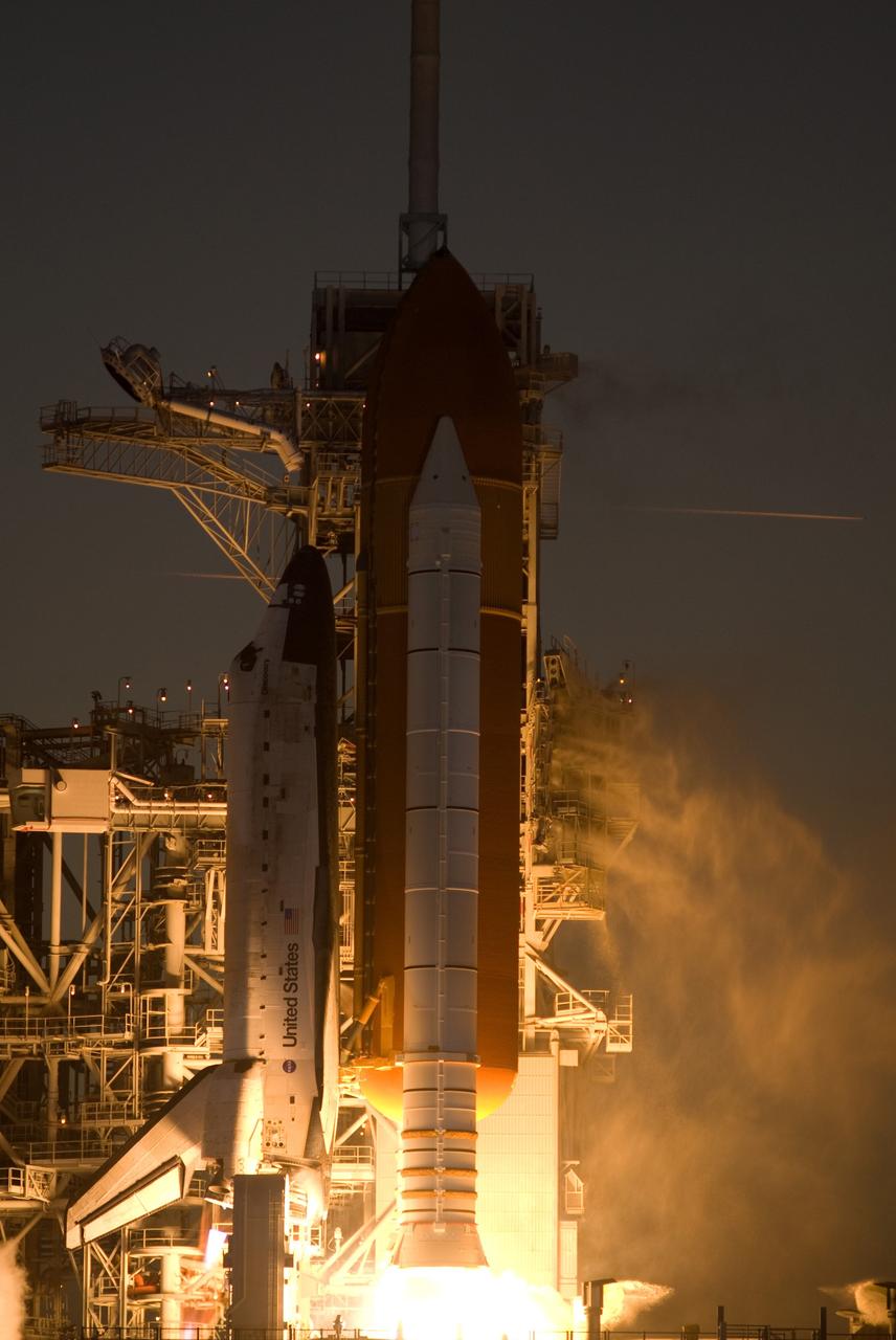 CAPE CANAVERAL, Fla. – At NASA's Kennedy Space Center in Florida, space shuttle Discovery rises from Launch Pad 39A on columns of fire as it begins its 13-day journey into space on mission STS-119.  Launch was on time at 7:43 p.m. EDT.  The STS-119 mission is the 28th to the International Space Station and the 125th space shuttle flight.  Discovery will deliver the final pair of power-generating solar array wings and the S6 truss segment.  Installation of S6 will signal the station's readiness to house a six-member crew for conducting increased science.  Photo credit: NASA/Rusty Backer, George Roberts