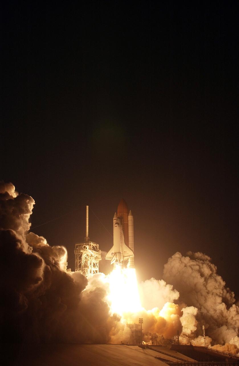 CAPE CANAVERAL, Fla. – Clouds of smoke and steam roll across Launch Pad 39A at NASA's Kennedy Space Center in Florida as space shuttle Discovery races toward space on mission STS-119.  Launch was on time at 7:43 p.m. EDT. The STS-119 mission is the 28th to the International Space Station and the 125th space shuttle flight.  Discovery will deliver the final pair of power-generating solar array wings and the S6 truss segment.  Installation of S6 will signal the station's readiness to house a six-member crew for conducting increased science.  Photo credit: NASA/Sandra Joseph, Kevin O'Connell