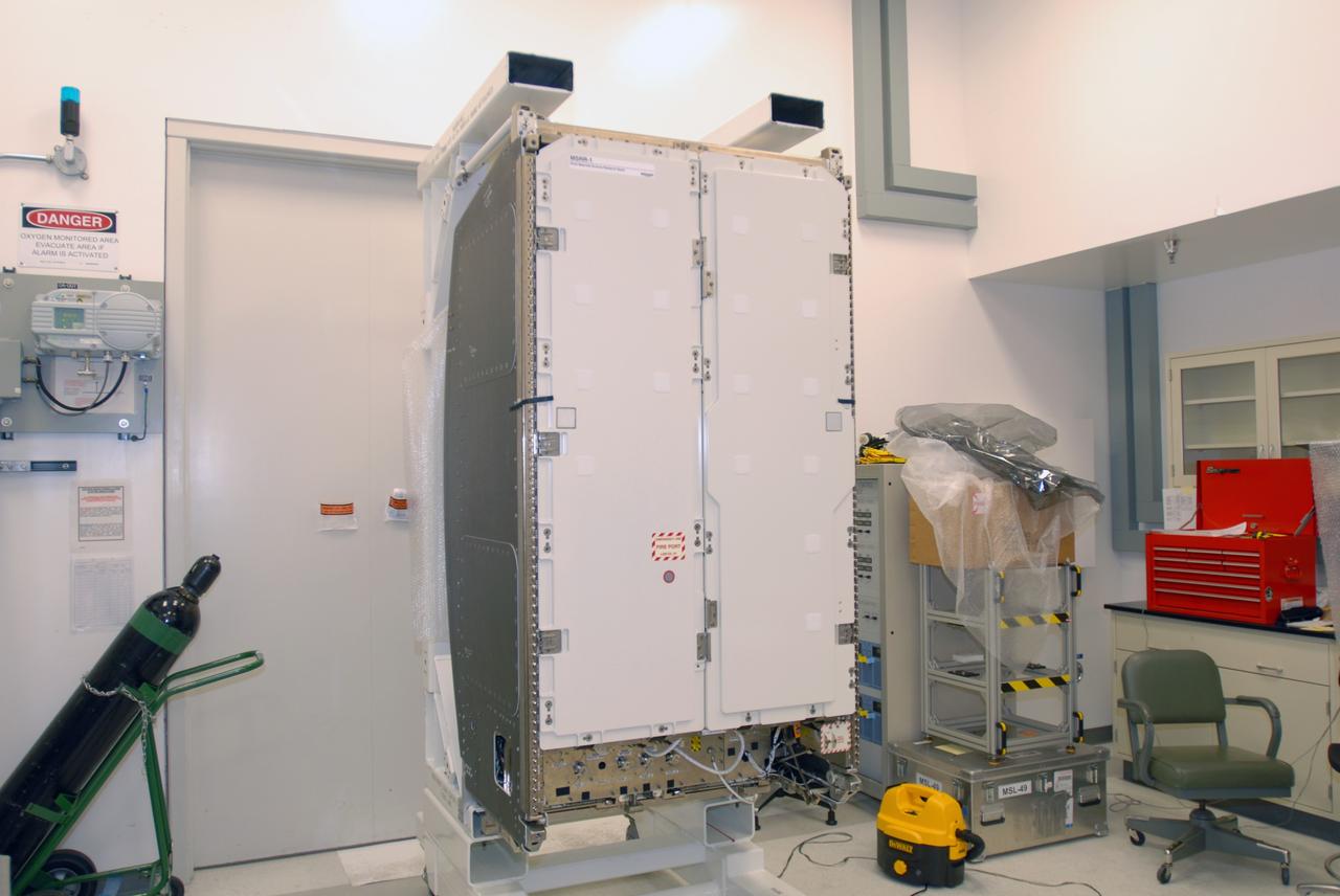 CAPE CANAVERAL, Fla. – The Materials Science Research Rack-1, or MSRR-1, arrived at NASA's Kennedy Space Center in Florida for final flight preparations.  The size of a large refrigerator, MSRR-1 is 6 feet high, 3.5 feet wide and 40 inches deep and weighs about 1 ton.  MSRR-1 is the payload for the STS-128 mission targeted to launch in August.  The rack will be installed in the Leonardo Multi-Purpose Logistics Module for transport to the International Space Station . After arriving at the station, the rack will be housed in the U.S. Destiny laboratory.  MSRR-1  will allow for study of a variety of materials including metals, ceramics, semiconductor crystals and glasses onboard the orbiting laboratory.  Photo credit: NASA/Jim Grossmann