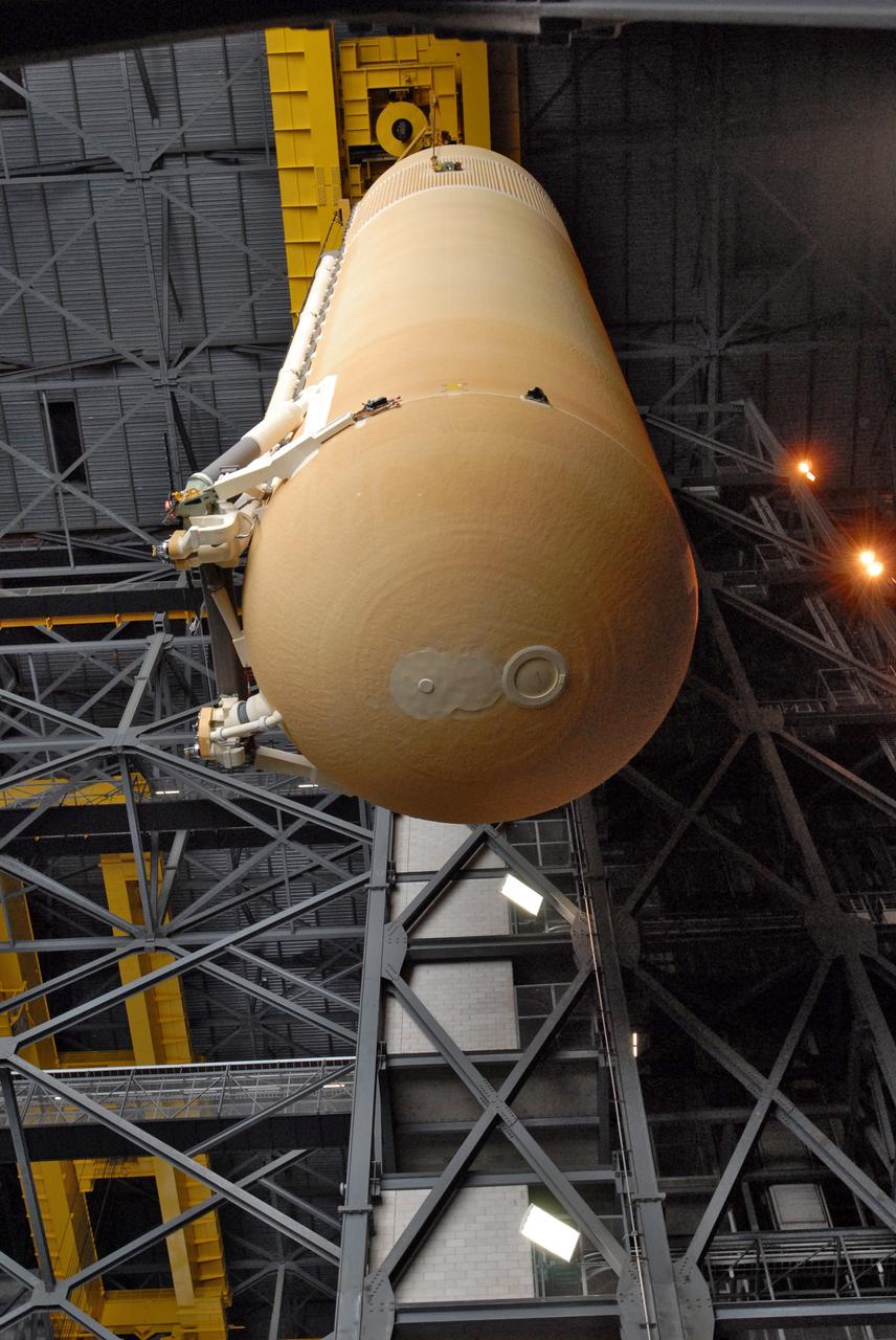 CAPE CANAVERAL, Fla. – In the Vehicle Assembly Building at NASA's Kennedy Space Center in Florida, the external fuel tank for space shuttle Endeavour is lifted out of the checkout cell. It will be moved into high bay 1 for stacking with the solid rocket boosters on the mobile launcher platform. Endeavour is the launch vehicle for the STS-127 mission. Endeavour will deliver the Japanese Experiment Module's Experiment Logistics Module-Exposed Section, or ELM-ES, to the International Space Station on STS-127. Launch is targeted for mid-June 2009. Photo credit: NASA/Jim Grossmann