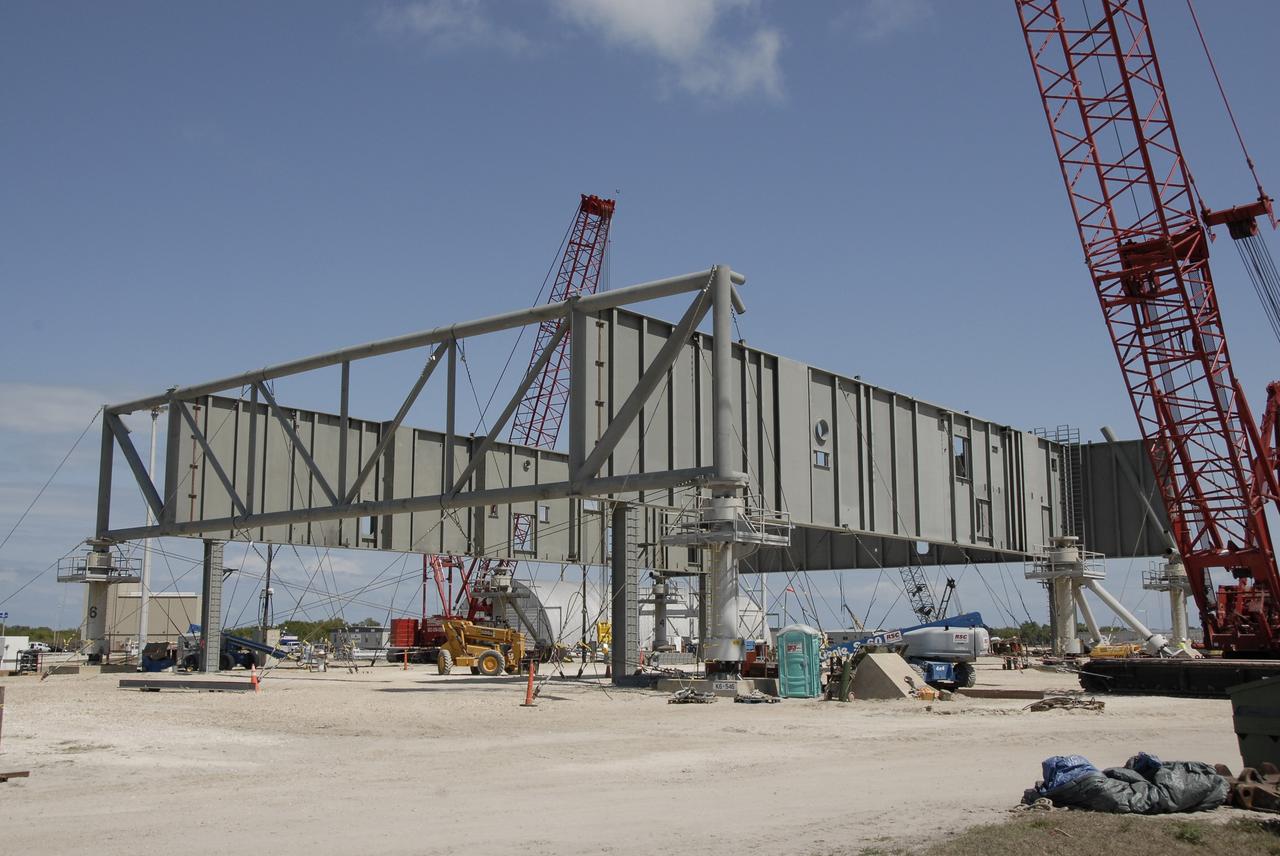 CAPE CANAVERAL, Fla. – At NASA's Kennedy Space Center in Florida, construction continues on a new mobile launcher for the Constellation Program. The new mobile launcher will be the base for the Ares rockets to launch the Orion crew exploration vehicle and the cargo vehicle. The base is being made lighter than space shuttle mobile launcher platforms so the crawler-transporter can pick up the added load of the 345-foot tower and taller rocket. When the structural portion of the new launcher is complete, umbilical lines, access arms, communications equipment and command/control equipment will be installed. Photo credit: NASA/Kim Shiflett