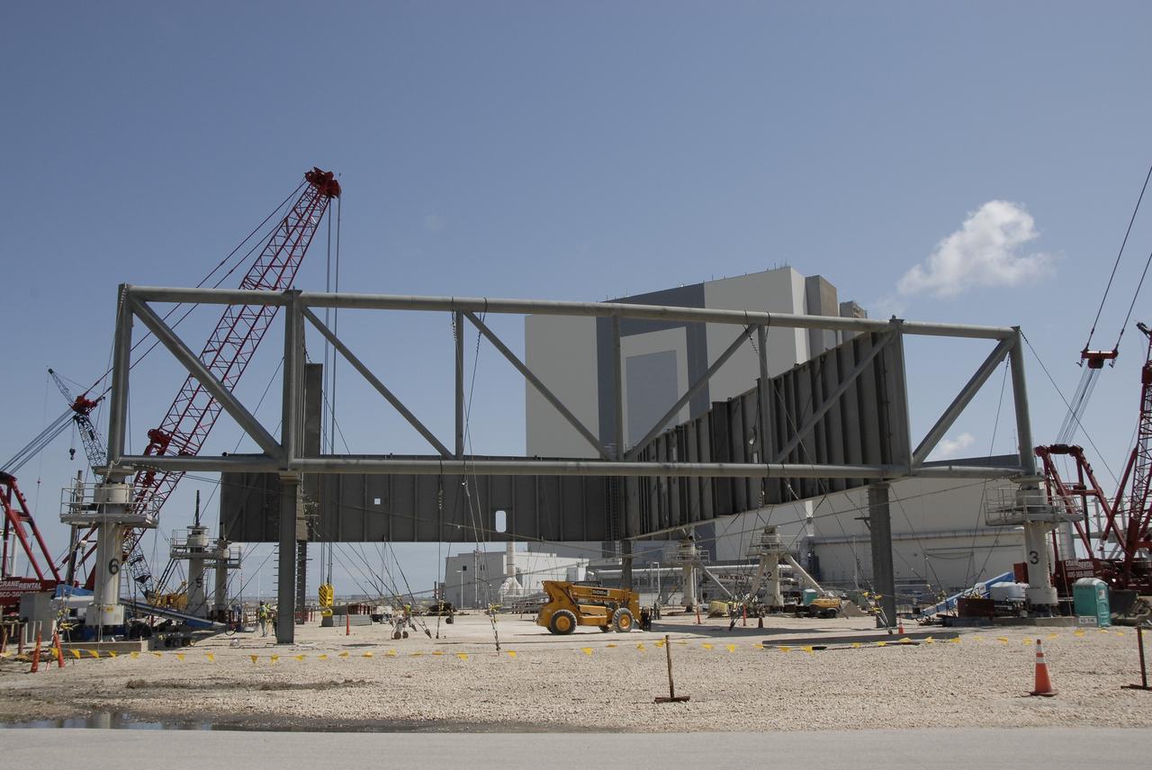 CAPE CANAVERAL, Fla. – At NASA's Kennedy Space Center in Florida, construction continues on a new mobile launcher for the Constellation Program.  The new mobile launcher will be the base for the Ares rockets to launch the Orion crew exploration vehicle and the cargo vehicle.  The base is being made lighter than space shuttle mobile launcher platforms so the crawler-transporter can pick up the added load of the 345-foot tower and taller rocket.  When the structural portion of the new launcher is complete, umbilical lines, access arms, communications equipment and command/control equipment will be installed.  Photo credit: NASA/Kim Shiflett