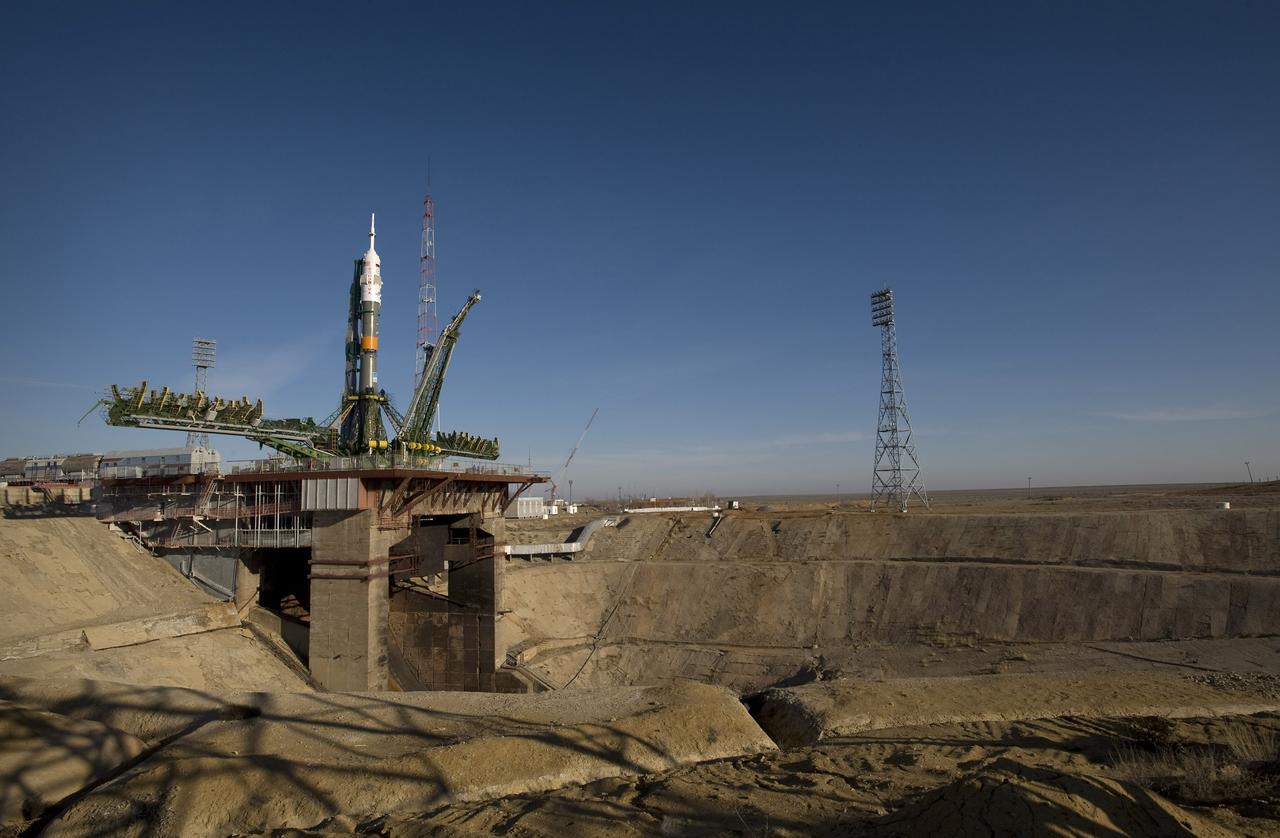 CAPE CANAVERAL, Fla. – The Soyuz rocket is erected into position at the launch pad March 24, 2009, at the Baikonur Cosmodrome in Kazakhstan.  The Soyuz is scheduled to launch the crew of Expedition 19 and a spaceflight participant on March 26, 2009.  Photo credit: NASA/Bill Ingalls