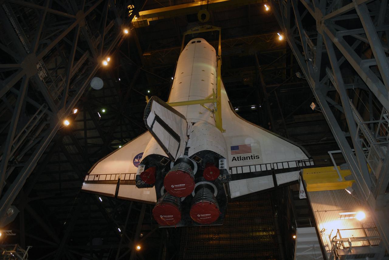 CAPE CANAVERAL, Fla. – In the Vehicle Assembly Building at NASA's Kennedy Space Center in Florida, space shuttle Atlantis is lowered into High Bay 3. In the bay, the shuttle will be mated with its external fuel tank and solid rocket boosters on the mobile launcher platform. After additional preparations are made, the shuttle will be rolled out to Launch Pad 39A for a targeted launch on May 12 on the STS-125 mission to service NASA's Hubble Space Telescope. Photo credit: NASA/Kim Shiflett