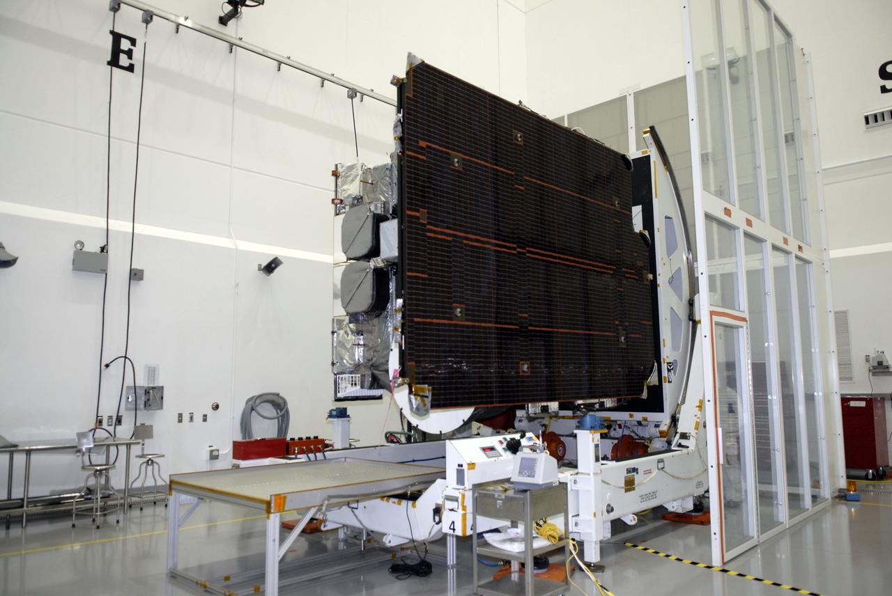 CAPE CANAVERAL, Fla. – At the Astrotech payload processing facility in Titusville, Fla., the GOES-O satellite is on a rotation stand.  The latest Geostationary Operational Environmental Satellite, GOES-O was developed by NASA for the National Oceanic and Atmospheric Administration, or NOAA. Once in orbit, GOES-O will be designated GOES-14, and NASA will provide on-orbit checkout and then transfer operational responsibility to NOAA. The GOES-O satellite is targeted to launch April 28 onboard a United Launch Alliance Delta IV expendable launch vehicle.  Photo credit: NASA/Kim Shiflett