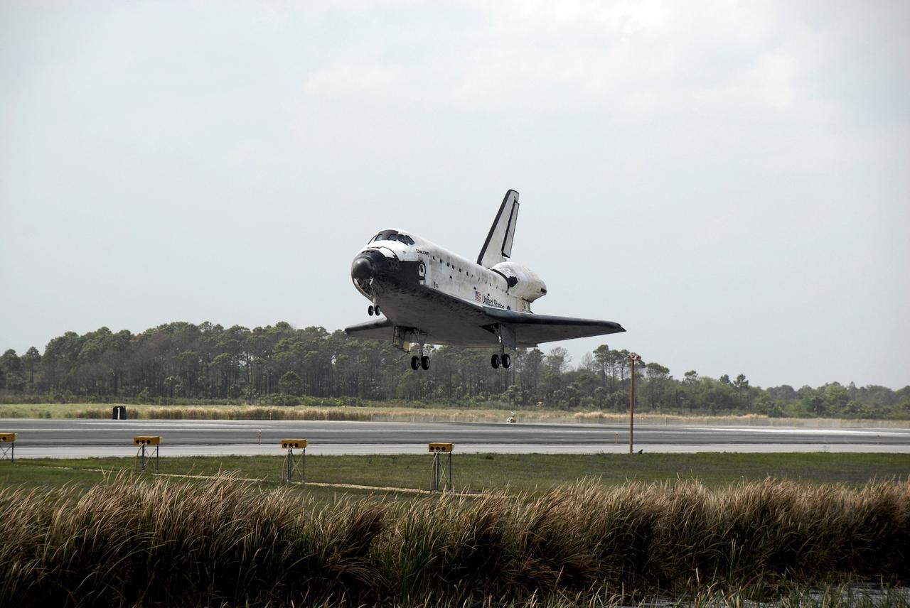 CAPE CANAVERAL, Fla. – Space shuttle Discovery approaches Runway 15 at NASA's Kennedy Space Center in Florida to complete the 13-day, 5.3-million mile journey on the STS-119 mission to the International Space Station. Main gear touchdown was at 3:13:17 p.m. EDT. Nose gear touchdown was at 3:13:40 p.m. and wheels stop was at 3:14:45 p.m. Discovery delivered the final pair of large power-generating solar array wings and the S6 truss segment. The mission was the 28th flight to the station, the 36th flight of Discovery and the 125th in the Space Shuttle Program, as well as the 70th landing at Kennedy. Photo credit: NASA/Kim Shiflett