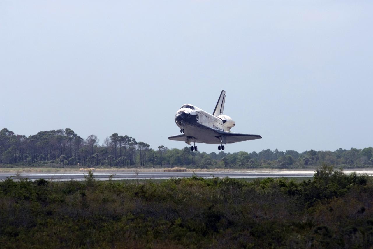 CAPE CANAVERAL, Fla. – Main landing gear are in place for touchdown of space shuttle Discovery on Runway 15 at NASA's Kennedy Space Center in Florida, completing the 13-day, 5.3-million mile journey on the STS-119 mission to the International Space Station.  Main gear touchdown was at 3:13:17 p.m. EDT.  Nose gear touchdown was at 3:13:40 p.m. and wheels stop was at 3:14:45 p.m.  Discovery delivered the final pair of large power-generating solar array wings and the S6 truss segment. The mission was the 28th flight to the station, the 36th flight of Discovery and the 125th in the Space Shuttle Program, as well as the 70th landing at Kennedy. Photo credit: NASA/Rick Wetherington