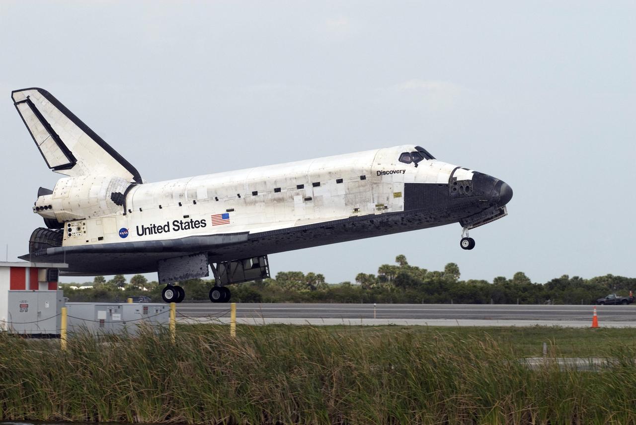 CAPE CANAVERAL, Fla. – Space shuttle Discovery touches down on Runway 15 at NASA's Kennedy Space Center in Florida to complete the 13-day, 5.3-million mile journey on the STS-119 mission to the International Space Station. Main gear touchdown was at 3:13:17 p.m. EDT. Nose gear touchdown was at 3:13:40 p.m. and wheels stop was at 3:14:45 p.m. Discovery delivered the final pair of large power-generating solar array wings and the S6 truss segment. The mission was the 28th flight to the station, the 36th flight of Discovery and the 125th in the Space Shuttle Program, as well as the 70th landing at Kennedy. Photo credit: NASA/Chuck Tintera