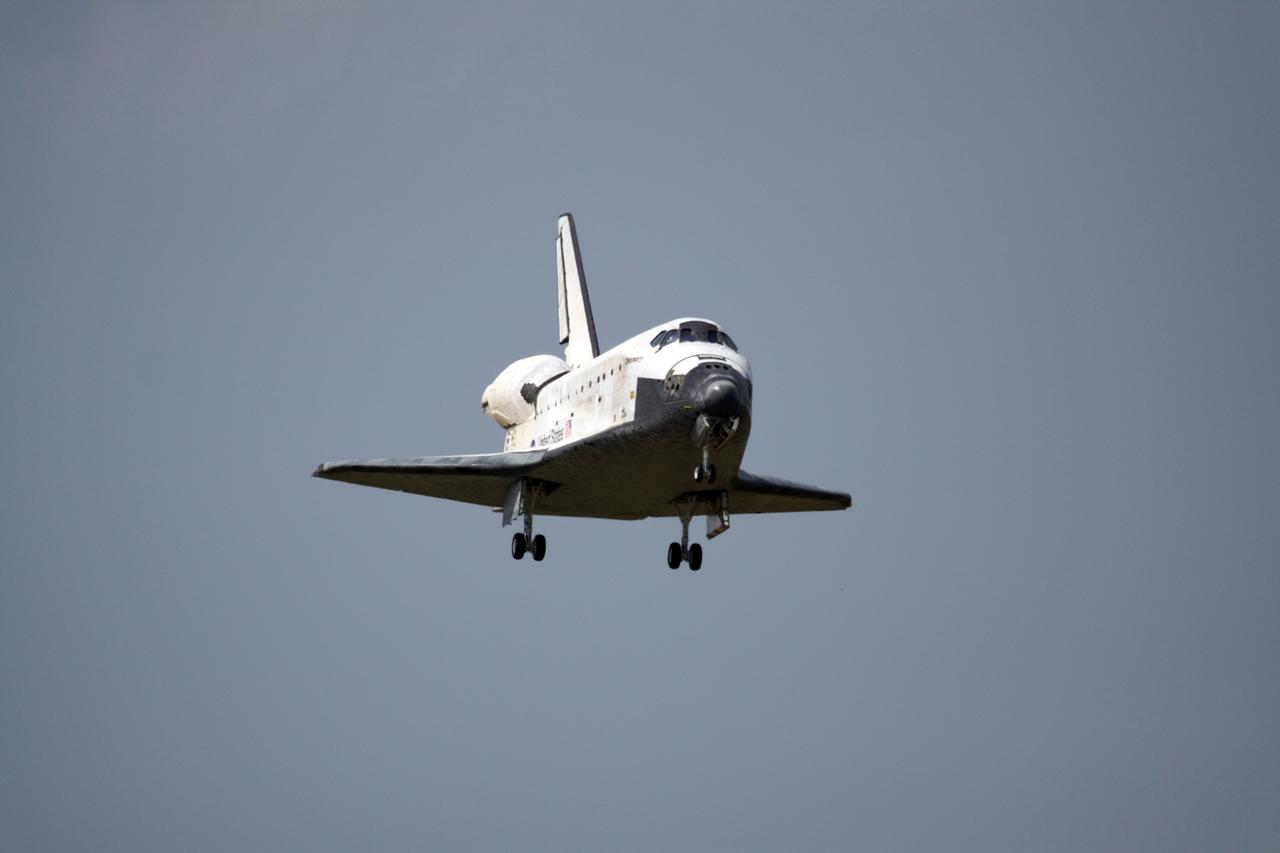 CAPE CANAVERAL, Fla. – Space shuttle Discovery approaches Runway 15 at NASA's Kennedy Space Center in Florida to complete the 13-day, 5.3-million mile journey on the STS-119 mission to the International Space Station. Main gear touchdown was at 3:13:17 p.m. EDT. Nose gear touchdown was at 3:13:40 p.m. and wheels stop was at 3:14:45 p.m. Discovery delivered the final pair of large power-generating solar array wings and the S6 truss segment. The mission was the 28th flight to the station, the 36th flight of Discovery and the 125th in the Space Shuttle Program, as well as the 70th landing at Kennedy. Photo credit: NASA/Kenny Allen