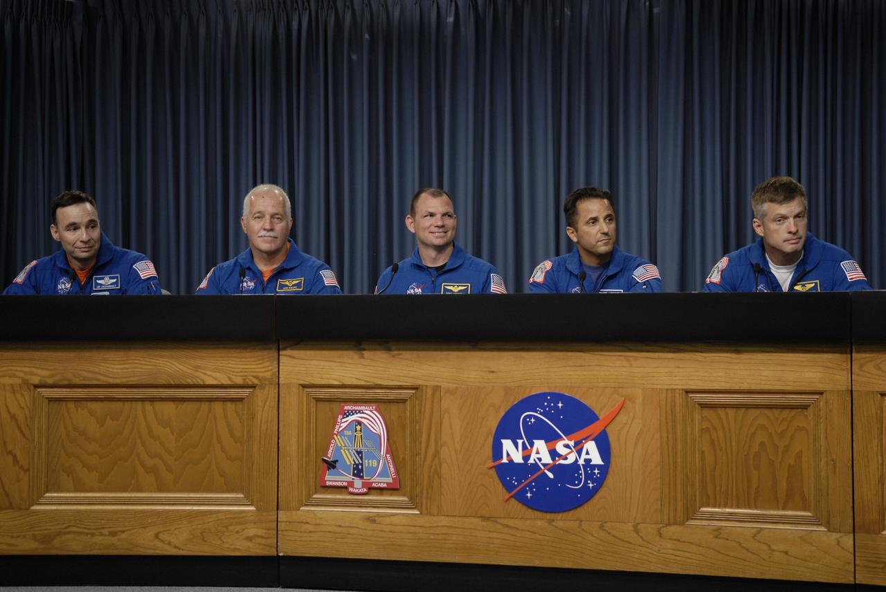 CAPE CANAVERAL, Fla. – At NASA's Kennedy Space Center in Florida, members of the STS-119 crew participate in a news conference following landing of the space shuttle Discovery STS-119 mission to the International Space Station. From left are Commander Lee Archambault, Mission Specialist John Phillips, Pilot Tony Antonelli and Mission Specialists Joseph Acaba and Steve Swanson. Main gear touchdown was at 3:13:17 p.m. EDT. Nose gear touchdown was at 3:13:40 p.m. and wheels stop was at 3:14:45 p.m. Discovery delivered the final pair of large power-generating solar array wings and the S6 truss segment. The mission was the 28th flight to the station, the 36th flight of Discovery and the 125th in the Space Shuttle Program, as well as the 70th landing at Kennedy. Photo credit: NASA/Kim Shiflett