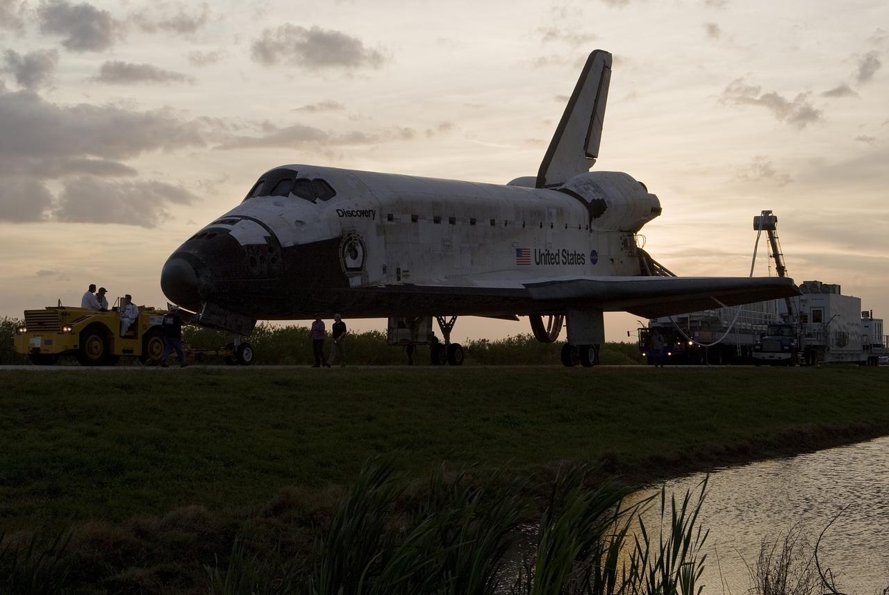 CAPE CANAVERAL, Fla. – Space shuttle Discovery is towed to Orbiter Processing Facility-3 following touchdown on Runway 15 at NASA's Kennedy Space Center in Florida to complete the 13-day, 5.3-million mile journey of the STS-119 mission to the International Space Station. Main gear touchdown was at 3:13:17 p.m. EDT.  Nose gear touchdown was at 3:13:40 p.m. and wheels stop was at 3:14:45 p.m.  Discovery delivered the final pair of large power-generating solar array wings and the S6 truss segment. The mission was the 28th flight to the station, the 36th flight of Discovery and the 125th in the Space Shuttle Program, as well as the 70th landing at Kennedy. Photo courtesy of Scott Andrews, Canon