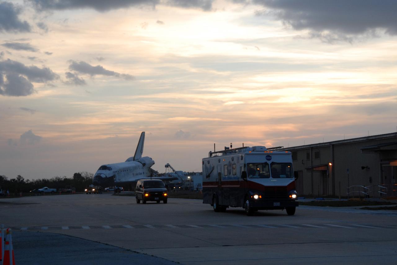 CAPE CANAVERAL, Fla. – After sunset, space shuttle Discovery is towed from the Shuttle Landing Facility at NASA's Kennedy Space Center in Florida to Orbiter Processing Facility 3. Discovery landed at 3:13:17 p.m. EDT after completing a 13-day journey of more than 5.3 million miles on the STS-119 mission. The mission was the 28th flight to the station, the 36th flight of Discovery and the 125th in the Space Shuttle Program, as well as the 70th landing at Kennedy. Photo credit: NASA/Jack Pfaller