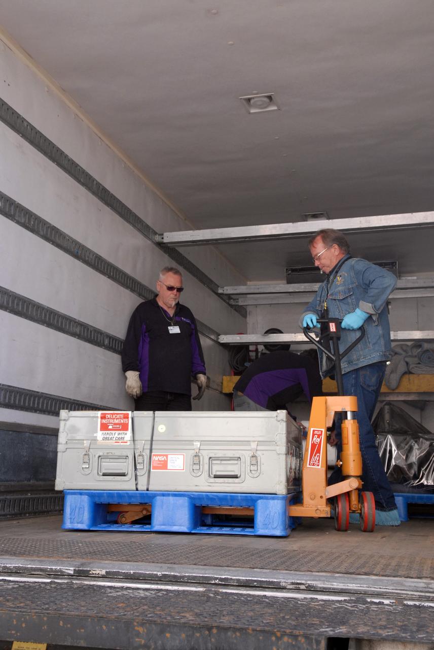 CAPE CANAVERAL, Fla. – The Science Instrument Command and Data Handling Unit, or SIC&DH, arrives at NASA's Kennedy Space Center in Florida.  The SIC&DH will be installed on the Hubble Space Telescope during space shuttle Atlantis' STS-125 mission. This unit will replace the one that suffered a failure aboard the orbiting telescope on Sept. 27, 2008.  The SIC&DH is being prepared for integration onto the Multi-Use Lightweight Equipment Carrier in the Payload Hazardous Servicing Facility. The carrier holds the payload for space shuttle Atlantis' STS-125 mission servicing NASA's Hubble Space Telescope, targeted to launch May 12.  Photo credit: NASA/Jack Pfaller