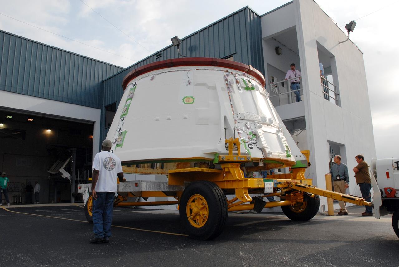 CAPE CANAVERAL, Fla. –  – The Ares I-X aft skirt is moved into the aft skirt test facility behind  the Assembly and Refurbishment Facility at NASA's Kennedy Space Center in Florida.  The I-X flight will provide NASA an early opportunity to test and prove hardware, facilities and ground operations associated with Ares I, part of the Constellation Program to return men to the moon and beyond.  Photo credit: NASA/Troy Cryder