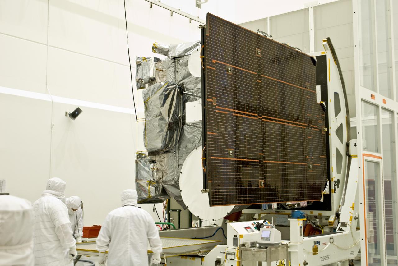 CAPE CANAVERAL, Fla. –  In the Astrotech payload processing facility in Titusville, Fla., the GOES-O satellite is rotated on a stand for blanket inspection.  The latest Geostationary Operational Environmental Satellite, GOES-O was developed by NASA for the National Oceanic and Atmospheric Administration, or NOAA. Once in orbit, GOES-O will be designated GOES-14, and NASA will provide on-orbit checkout and then transfer operational responsibility to NOAA. The GOES-O satellite is targeted to launch April 28 onboard a United Launch Alliance Delta IV expendable launch vehicle.    Photo credit: NASA/Jim Grossmann