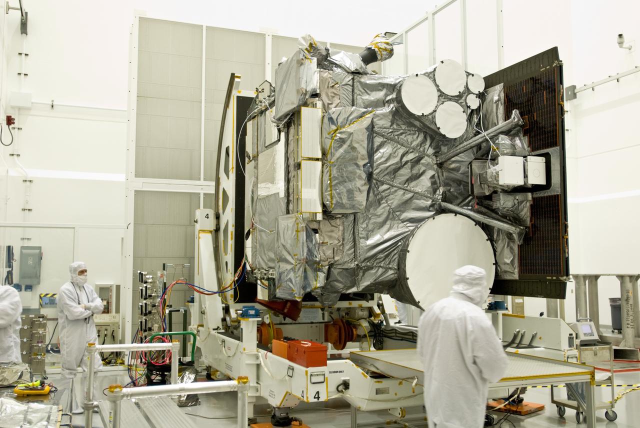 CAPE CANAVERAL, Fla. –  In the Astrotech payload processing facility in Titusville, Fla., the GOES-O satellite is rotated on a stand for blanket inspection.  The latest Geostationary Operational Environmental Satellite, GOES-O was developed by NASA for the National Oceanic and Atmospheric Administration, or NOAA. Once in orbit, GOES-O will be designated GOES-14, and NASA will provide on-orbit checkout and then transfer operational responsibility to NOAA. The GOES-O satellite is targeted to launch April 28 onboard a United Launch Alliance Delta IV expendable launch vehicle.    Photo credit: NASA/Jim Grossmann