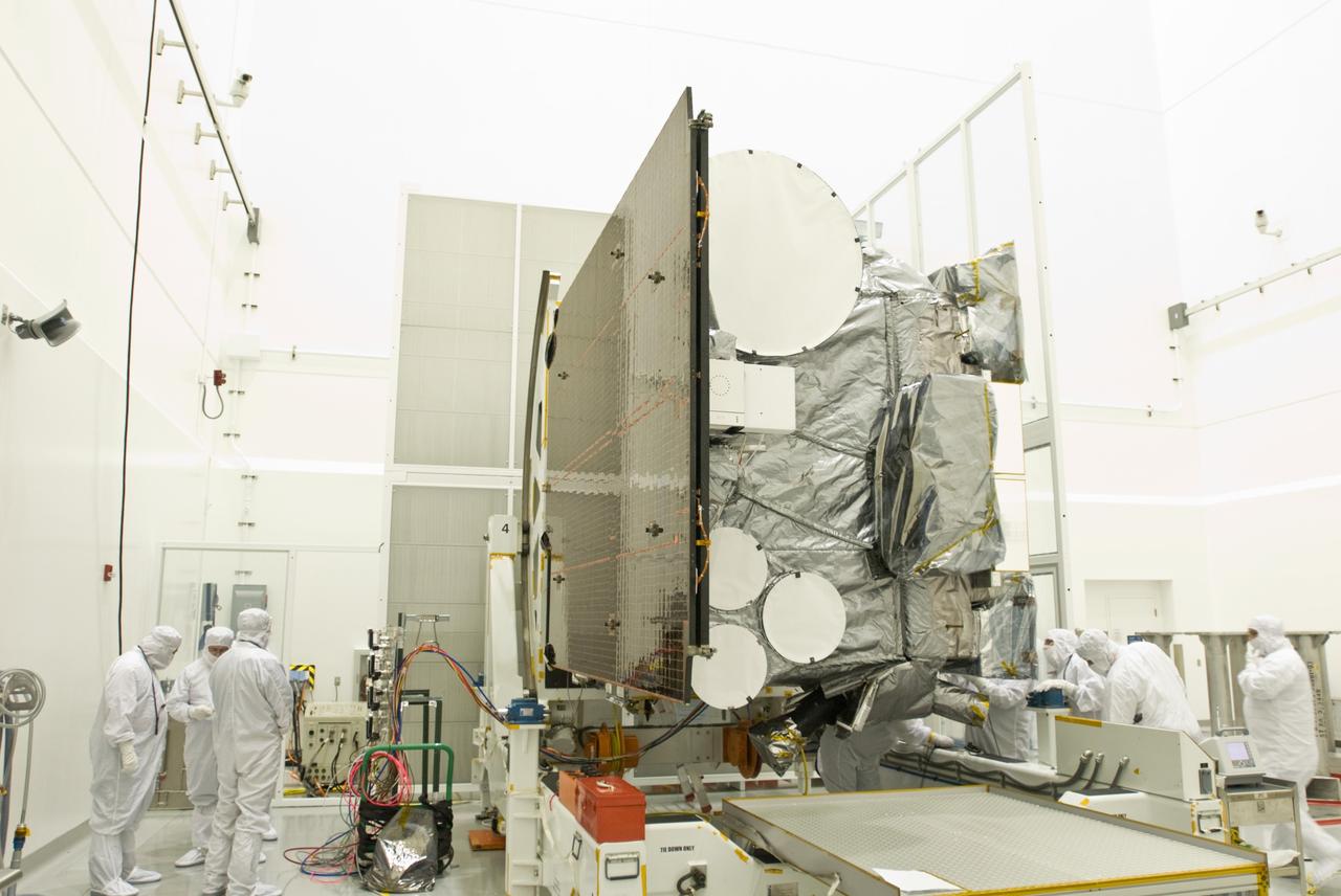 CAPE CANAVERAL, Fla. –  In the Astrotech payload processing facility in Titusville, Fla., the GOES-O satellite is rotated on a stand for blanket inspection.  The latest Geostationary Operational Environmental Satellite, GOES-O was developed by NASA for the National Oceanic and Atmospheric Administration, or NOAA. Once in orbit, GOES-O will be designated GOES-14, and NASA will provide on-orbit checkout and then transfer operational responsibility to NOAA. The GOES-O satellite is targeted to launch April 28 onboard a United Launch Alliance Delta IV expendable launch vehicle.    Photo credit: NASA/Jim Grossmann
