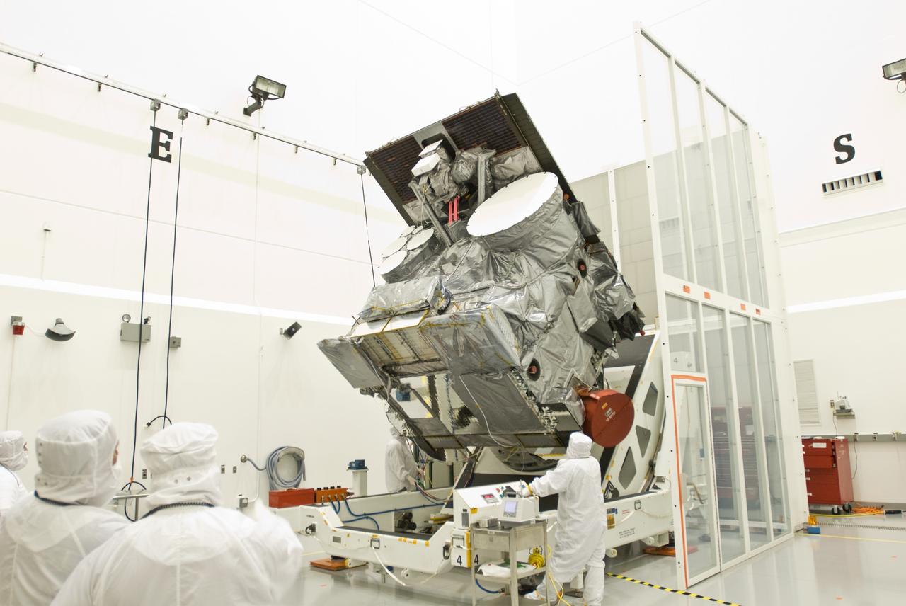 CAPE CANAVERAL, Fla. –  In the Astrotech payload processing facility in Titusville, Fla., the GOES-O satellite is rotated on a stand toward a vertical position after blanket inspection. The latest Geostationary Operational Environmental Satellite, GOES-O was developed by NASA for the National Oceanic and Atmospheric Administration, or NOAA. Once in orbit, GOES-O will be designated GOES-14, and NASA will provide on-orbit checkout and then transfer operational responsibility to NOAA. The GOES-O satellite is targeted to launch April 28 onboard a United Launch Alliance Delta IV expendable launch vehicle.    Photo credit: NASA/Jim Grossmann