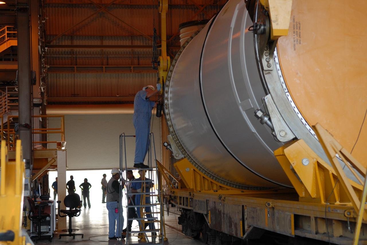 CAPE CANAVERAL, Fla. –  In the Rotation, Processing and Surge Facility at NASA's Kennedy Space Center in Florida, the Ares I-X center forward segment is prepared for lifting from the transporter.  Once vertical, the segment will be moved to a stand. The booster used for the Ares I-X launch is being modified by adding new forward structures and a fifth segment simulator. The stacking operations are scheduled to begin in the Vehicle Assembly Building in April. Launch of the Ares I-X flight test is targeted for July 2009. Photo credit: NASA/Troy Cryder