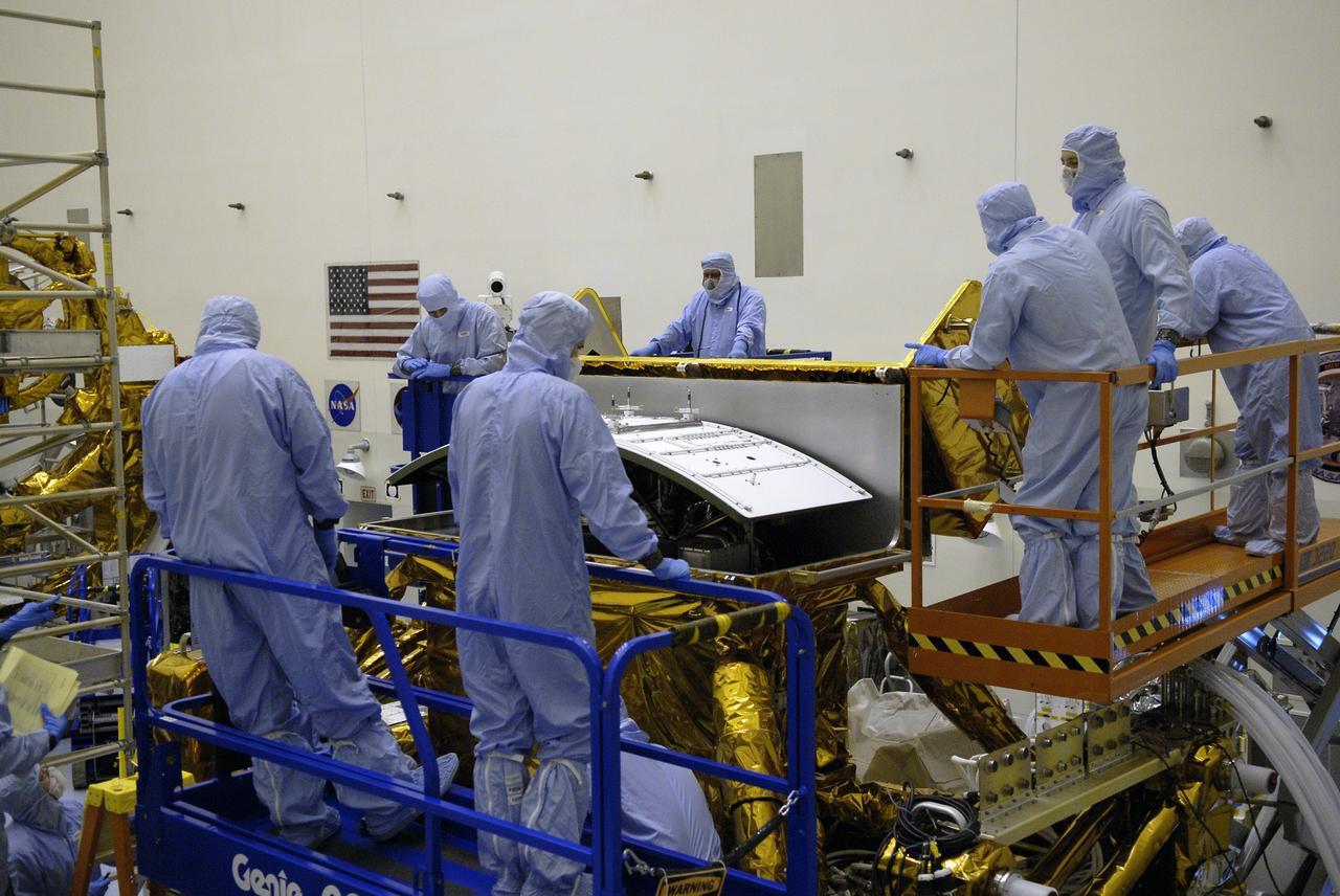 CAPE CANAVERAL, Fla. –  STS-125 crew members conduct equipment and procedure familiarization on parts of the payload in the Payload Hazardous Servicing Facility at NASA's Kennedy Space Center in Florida in preparation for their mission to service NASA's Hubble Space Telescope.  Space shuttle Atlantis' 11-day flight is targeted for launch May 12 and will include five spacewalks to refurbish and upgrade the telescope with state-of-the-art science instruments. The payload includes a Wide Field Camera 3, fine guidance sensor and the Cosmic Origins Spectrograph. As a result, Hubble's capabilities will be expanded and its operational lifespan extended through at least 2014.   Photo credit: NASA/Kim Shiflett