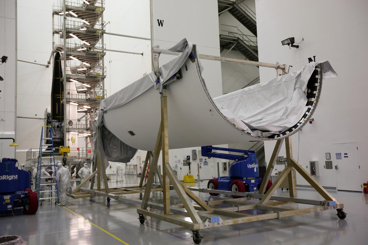 CAPE CANAVERAL, Fla. – In the Astrotech payload processing facility in Titusville, Fla., the second half of the payload fairing is ready to be lifted to vertical. It will be installed around the GOES-O satellite. The fairing is a molded structure that fits flush with the outside surface of the rocket and forms an aerodynamically smooth nose cone, protecting the spacecraft during launch and ascent. The latest Geostationary Operational Environmental Satellite, GOES-O was developed by NASA for the National Oceanic and Atmospheric Administration, or NOAA. The GOES satellites continuously provide observations of 60 percent of the Earth including the continental United States, providing weather monitoring and forecast operations as well as a continuous and reliable stream of environmental information and severe weather warnings. Once in orbit, GOES-O will be designated GOES-14, and NASA will provide on-orbit checkout and then transfer operational responsibility to NOAA. The GOES-O satellite is targeted to launch from Cape Canaveral Air Force Station's Launch Complex 37 on April 28 onboard a United Launch Alliance Delta IV expendable launch vehicle. Photo credit: NASA/Dimitri Gerondidakis