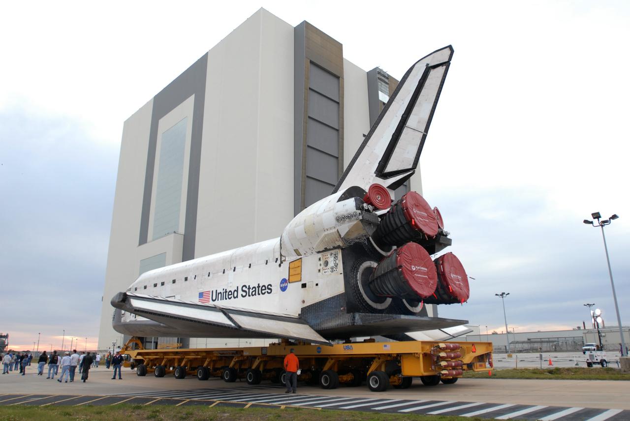 CAPE CANAVERAL, Fla. – Workers accompany space shuttle Endeavour as it rolls from Orbiter Processing Facility 2 to the Vehicle Assembly Building at NASA’s Kennedy Space Center, Fla. In the VAB, Endeavour will be lifted into High Bay 1 and mated to the external fuel tank and solid rocket boosters already installed on the mobile launcher platform. Endeavour is scheduled to roll out to Launch Pad 39B in about a week. Endeavour will be prepared on the pad for liftoff in the unlikely event that a rescue mission is necessary following space shuttle Atlantis' launch on the STS-125 mission to service the Hubble Space Telescope. After Atlantis is cleared to land, Endeavour will move to Launch Pad 39A for its upcoming STS-127 mission to the International Space Station, targeted to launch in mid-June. Photo credit: NASA/Jim Grossmann