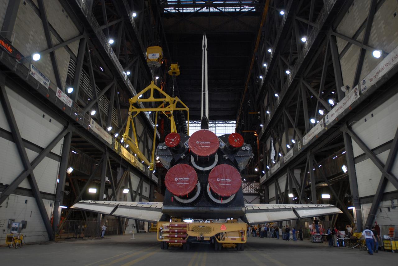 CAPE CANAVERAL, Fla. – In the transfer aisle of the Vehicle Assembly Building at NASA's Kennedy Space Center, Fla., space shuttle Endeavour is in position to be lifted into a high bay.  The first motion of the shuttle out of Orbiter Processing Facility 2 was at 6:56 a.m. EDT. In the VAB, Endeavour will be lifted into High Bay 1 and mated to the external fuel tank and solid rocket boosters already installed on the mobile launcher platform. Endeavour is scheduled to roll out to Launch Pad 39B in about a week.  Endeavour will be prepared on the pad for liftoff in the unlikely event that a rescue mission is necessary following space shuttle Atlantis' launch on the STS-125 mission to service the Hubble Space Telescope. After Atlantis is cleared to land, Endeavour will move to Launch Pad 39A for its upcoming STS-127 mission to the International Space Station, targeted to launch in mid-June.   Photo credit: NASA/Jim Grossmann