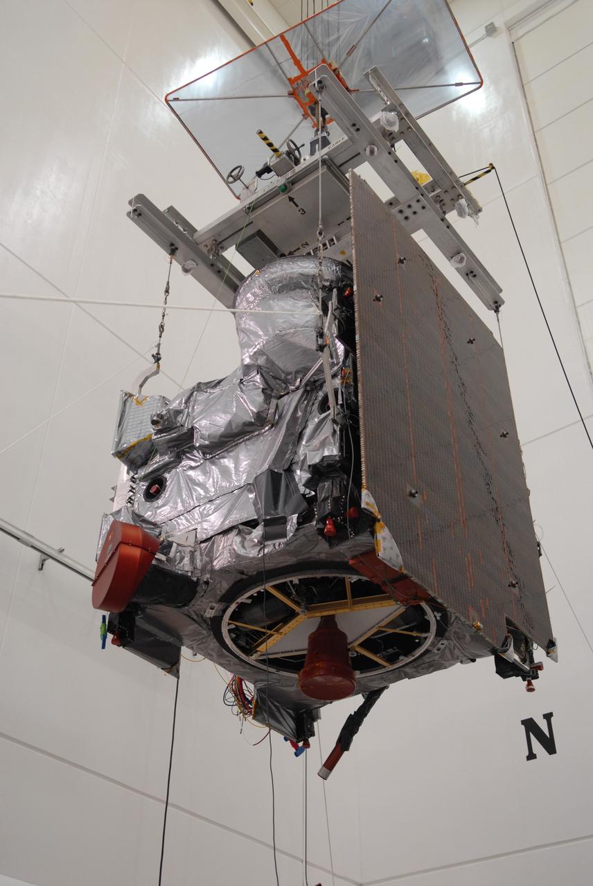 CAPE CANAVERAL, Fla. – In the Astrotech payload processing facility in Titusville, Fla., the GOES-O satellite is moved toward a special stand for loading of its oxidizer and hydrazine propellants. The latest Geostationary Operational Environmental Satellite, GOES-O was developed by NASA for the National Oceanic and Atmospheric Administration, or NOAA. The GOES satellites continuously provide observations of 60 percent of the Earth including the continental United States, providing weather monitoring and forecast operations as well as a continuous and reliable stream of environmental information and severe weather warnings. Once in orbit, GOES-O will be designated GOES-14, and NASA will provide on-orbit checkout and then transfer operational responsibility to NOAA. The GOES-O satellite is targeted to launch from Cape Canaveral Air Force Station's Launch Complex 37 no earlier than May 12 onboard a United Launch Alliance Delta IV expendable launch vehicle.  Photo credit: NASA/Troy Cryder