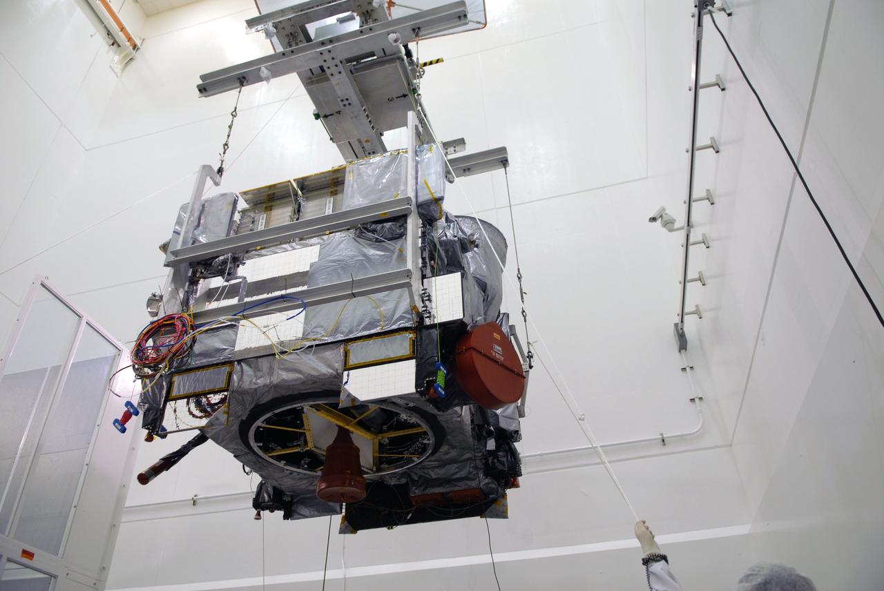 CAPE CANAVERAL, Fla. – In the Astrotech payload processing facility in Titusville, Fla., the GOES-O satellite is gently moved toward a special stand for loading of its oxidizer and hydrazine propellants. The latest Geostationary Operational Environmental Satellite, GOES-O was developed by NASA for the National Oceanic and Atmospheric Administration, or NOAA. The GOES satellites continuously provide observations of 60 percent of the Earth including the continental United States, providing weather monitoring and forecast operations as well as a continuous and reliable stream of environmental information and severe weather warnings. Once in orbit, GOES-O will be designated GOES-14, and NASA will provide on-orbit checkout and then transfer operational responsibility to NOAA. The GOES-O satellite is targeted to launch from Cape Canaveral Air Force Station's Launch Complex 37 no earlier than May 12 onboard a United Launch Alliance Delta IV expendable launch vehicle.  Photo credit: NASA/Troy Cryder