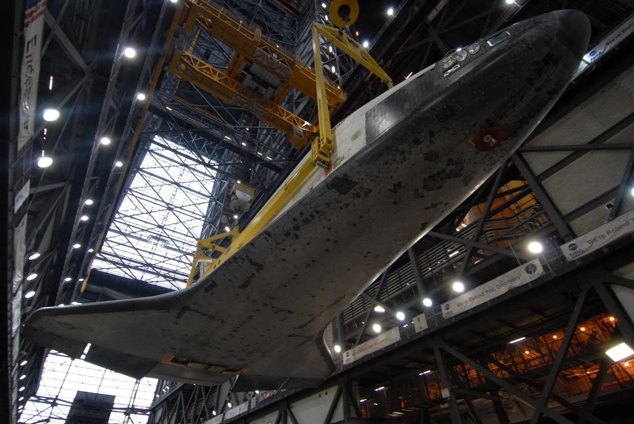 CAPE CANAVERAL, Fla. – In the transfer aisle of the Vehicle Assembly Building at NASA's Kennedy Space Center in Florida, cranes lift space shuttle Endeavour in order to raise it to vertical. Once vertical, the shuttle will be lifted into High Bay 1, then lowered and attached to the external fuel tank and solid rocket boosters already installed on the mobile launcher platform. Endeavour is scheduled to roll out to Launch Pad 39B on April 17. Endeavour will be prepared on the pad for liftoff in the unlikely event that a rescue mission is necessary following space shuttle Atlantis' launch on the STS-125 mission to service the Hubble Space Telescope. After Atlantis is cleared to land, Endeavour will move to Launch Pad 39A for its upcoming STS-127 mission to the International Space Station, targeted to launch in mid-June. Photo credit: NASA/Troy Cryder