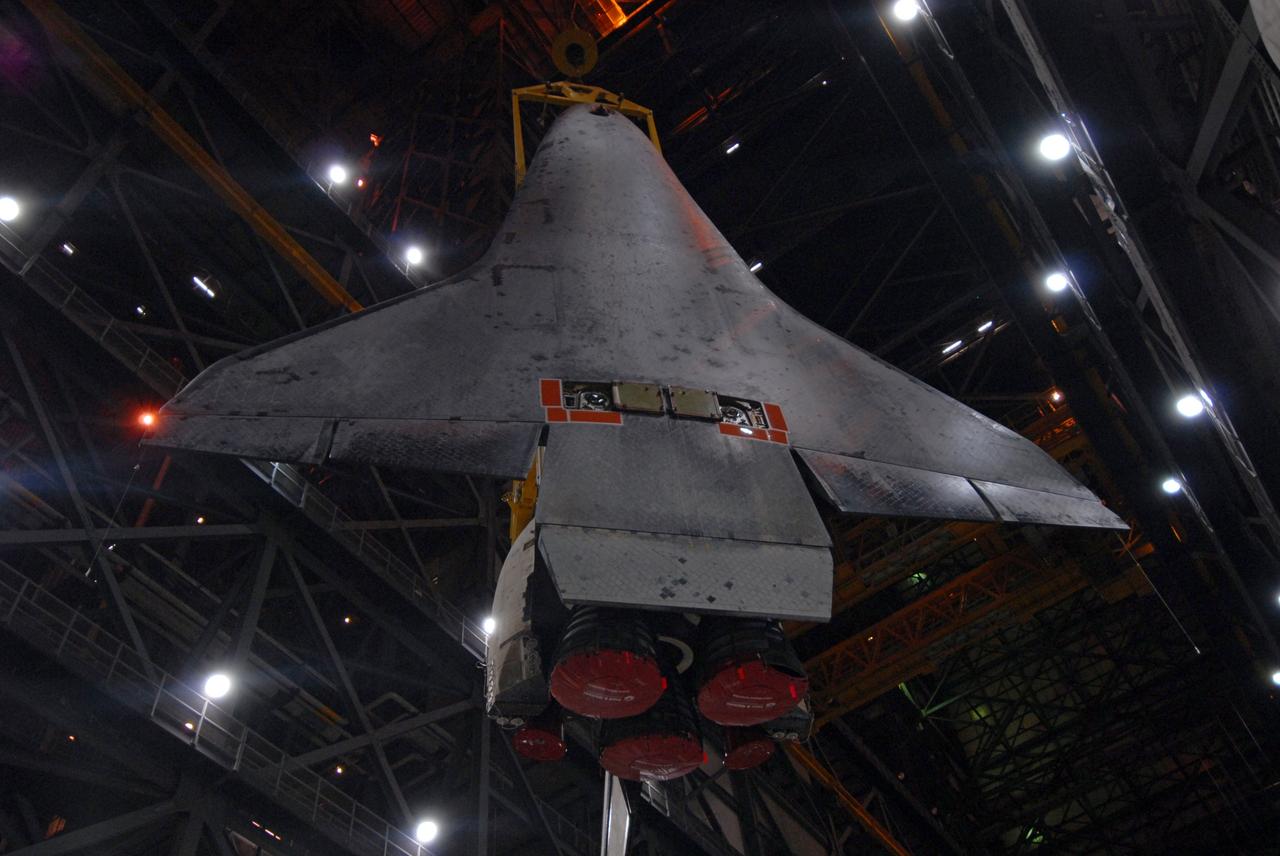 CAPE CANAVERAL, Fla. – Viewed from below, space shuttle Endeavour is lifted in the upper levels of the Vehicle Assembly Building at NASA's Kennedy Space Center in Florida for transfer to High Bay 1. The shuttle then will be lowered onto the mobile launcher platform and attached to the external fuel tank and solid rocket boosters already installed there. Endeavour is scheduled to roll out to Launch Pad 39B on April 17. Endeavour will be prepared on the pad for liftoff in the unlikely event that a rescue mission is necessary following space shuttle Atlantis' launch on the STS-125 mission to service the Hubble Space Telescope. After Atlantis is cleared to land, Endeavour will move to Launch Pad 39A for its upcoming STS-127 mission to the International Space Station, targeted to launch in mid-June. Photo credit: NASA/Troy Cryder