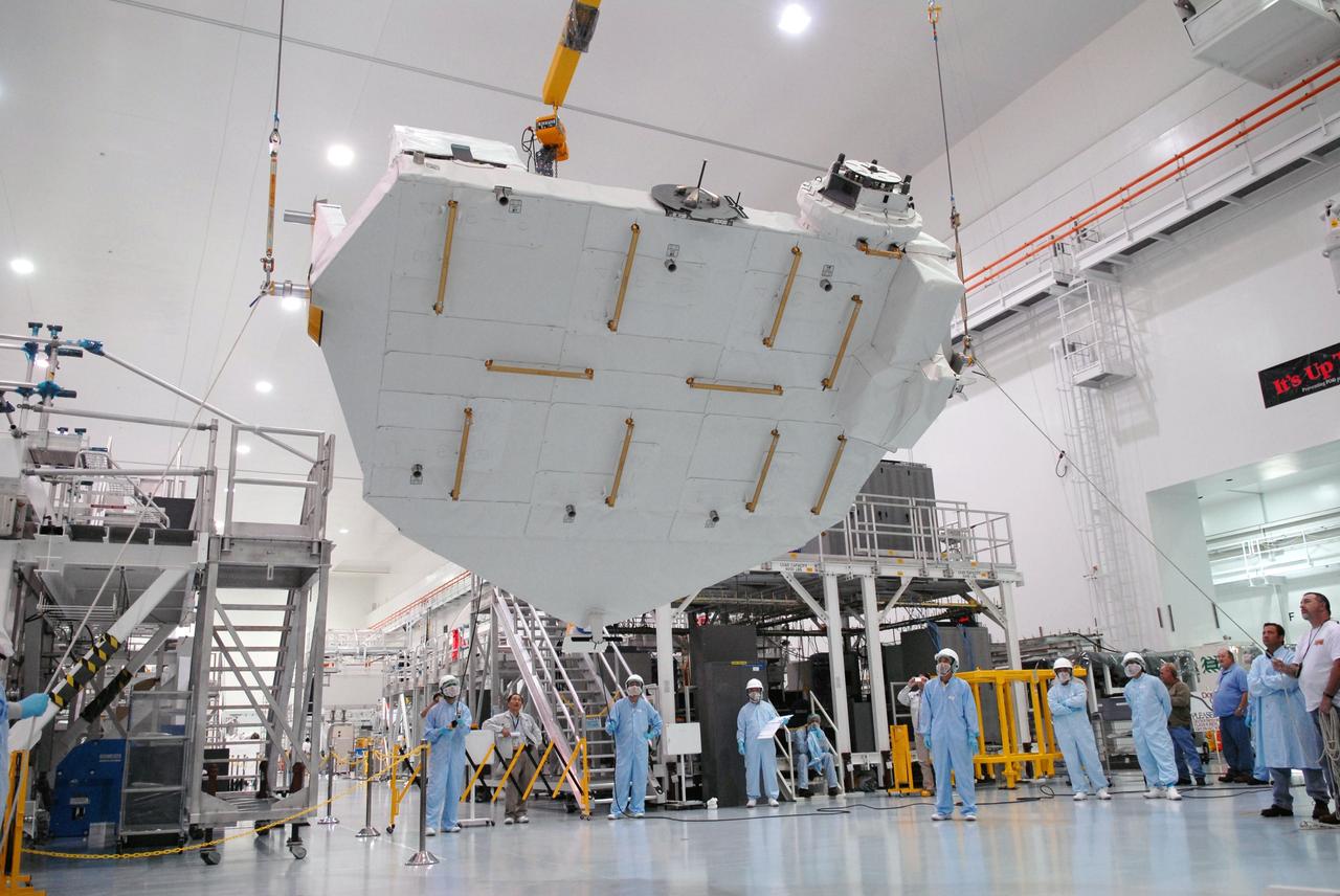 CAPE CANAVERAL, Fla. – In the Space Station Processing Facility at NASA's Kennedy Space Center in Florida, the Kibo Experiment Logistics Module Exposed Section, or ELM-ES, is rotated before being moved to a workstand. The ELM-ES is one of the final components of the Japan Aerospace Exploration Agency's Kibo laboratory for the International Space Station.  It can provide payload storage space and can carry up to three payloads at launch. The ELM-ES will be carried aboard space shuttle Endeavour on the STS-127 mission targeted for launch June 13.  Photo credit: NASA/Jack Pfaller
