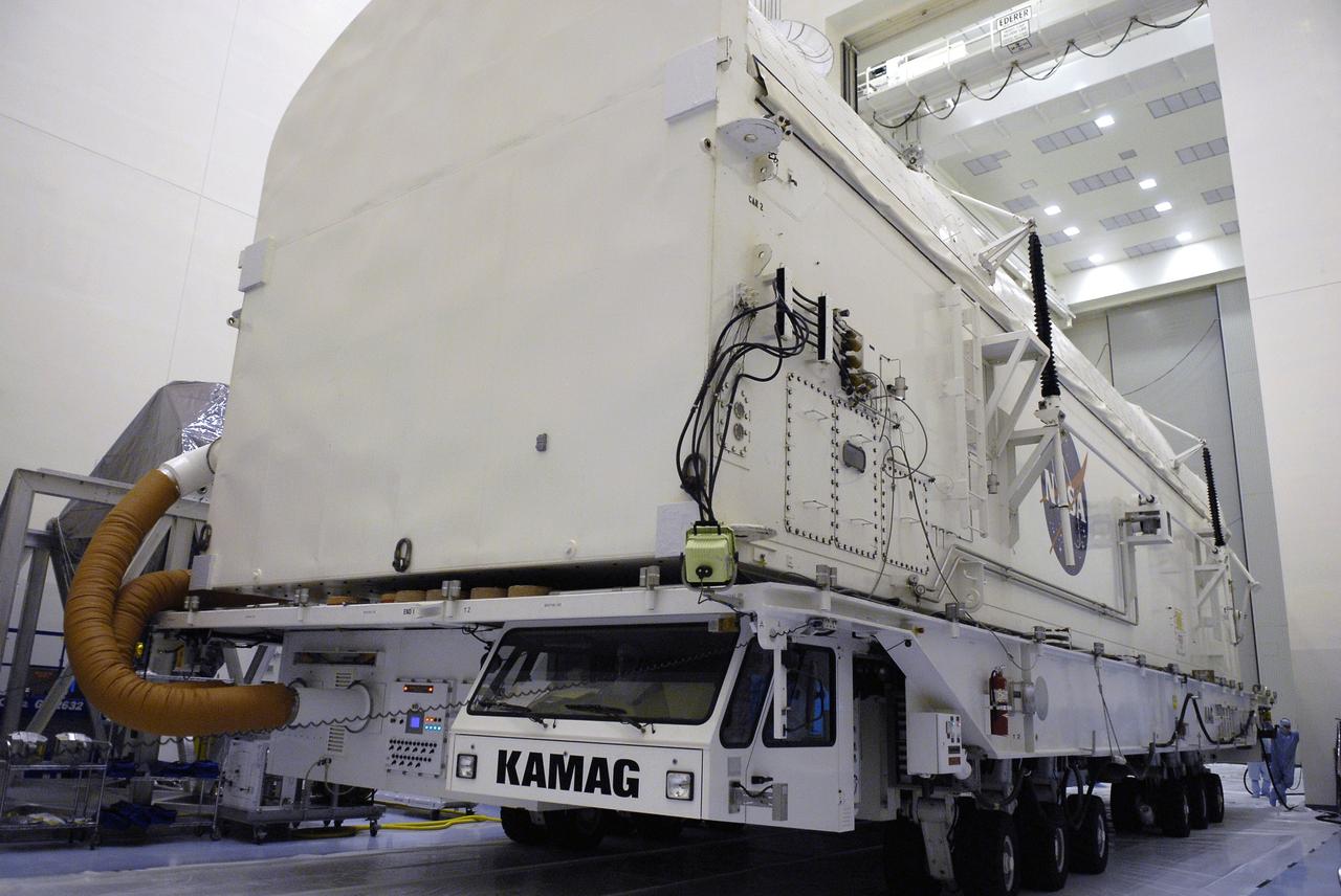 CAPE CANAVERAL, Fla. – At NASA's Kennedy Space Center in Florida, the payload canister rolls into the clean-room environment of the Payload Hazardous Servicing Facility for the loading of Hubble hardware and equipment.  The canister will deliver its cargo to Launch Pad 39A where it will be transferred to space shuttle Atlantis. Atlantis is targeted to launch May 12 on the STS-125 mission to service the Hubble Space Telescope.   Photo credit: NASA/Kim Shiflett