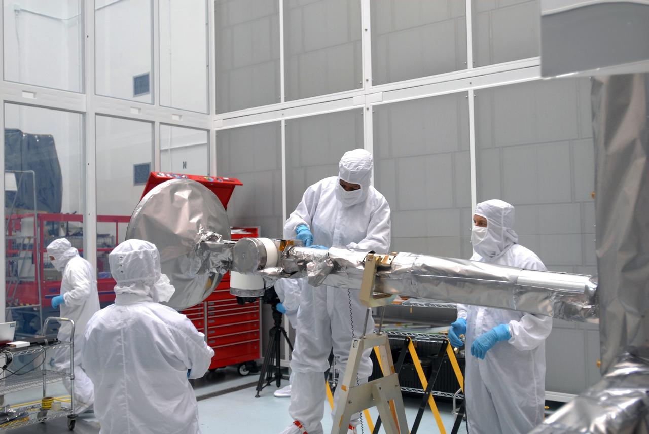 CAPE CANAVERAL, Fla. – At Astrotech Space Operations in Titusville, Fla., technicians are testing the range of motion on the high-gain antenna for the Lunar Reconnaissance Orbiter.  The orbiter will carry seven instruments to provide scientists with detailed maps of the lunar surface and enhance our understanding of the moon's topography, lighting conditions, mineralogical composition and natural resources. Information gleaned from LRO will be used to select safe landing sites, determine locations for future lunar outposts and help mitigate radiation dangers to astronauts.  Launch of LRO is targeted no earlier than June 2.  Photo credit: NASA/Jim Grossmann