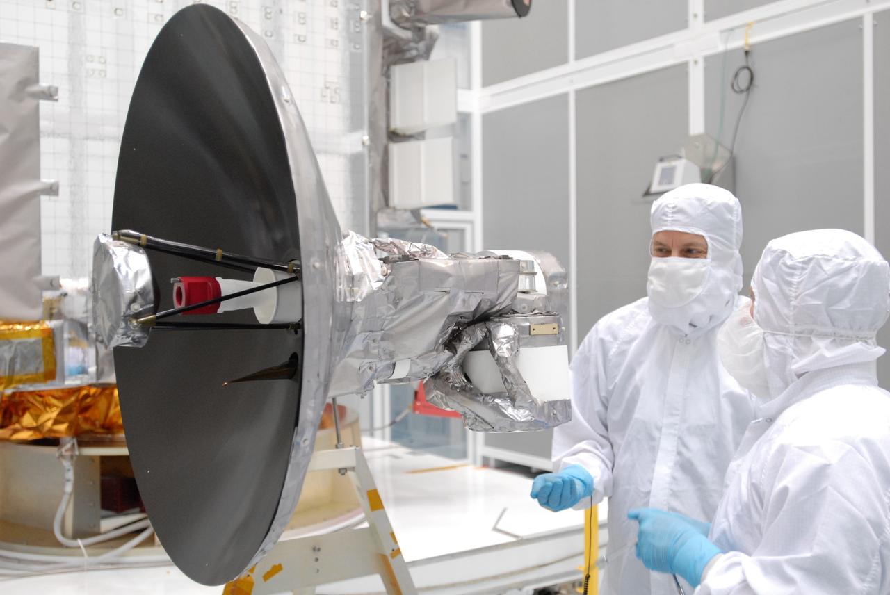 CAPE CANAVERAL, Fla. – At Astrotech Space Operations in Titusville, Fla., technicians are testing the range of motion on the high-gain antenna for the Lunar Reconnaissance Orbiter.  The orbiter will carry seven instruments to provide scientists with detailed maps of the lunar surface and enhance our understanding of the moon's topography, lighting conditions, mineralogical composition and natural resources. Information gleaned from LRO will be used to select safe landing sites, determine locations for future lunar outposts and help mitigate radiation dangers to astronauts.  Launch of LRO is targeted no earlier than June 2.  Photo credit: NASA/Jim Grossmann