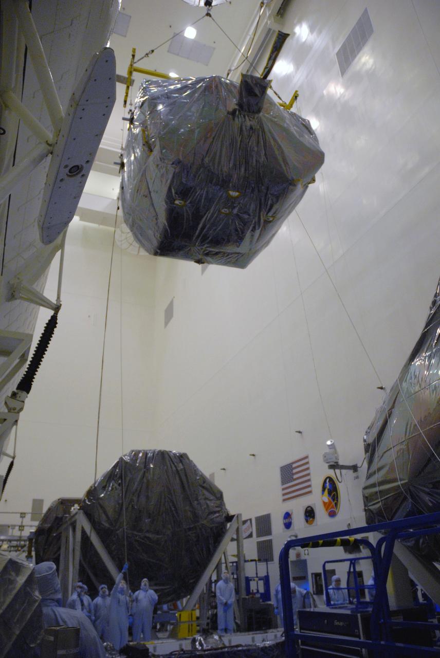 CAPE CANAVERAL, Fla. – In the Payload Hazardous Servicing Facility at NASA's Kennedy Space Center in Florida, the Orbital Replacement Unit Carrier, or ORUC, is moved from its workstand toward the payload canister.  The canister will deliver the ORUC and other carriers to Launch Pad 39A for installation in space shuttle Atlantis' payload bay.  Atlantis' 11-day flight to service NASA's Hubble Space Telescope is targeted for launch May 12.  The mission will include five spacewalks in which astronauts will refurbish and upgrade the telescope with state-of-the-art science instruments. As a result, Hubble's capabilities will be expanded and its operational lifespan extended through at least 2014.    Photo credit: NASA/Tim Jacobs
