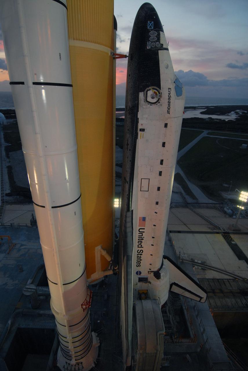 CAPE CANAVERAL, Fla. – Just before dawn, space shuttle Endeavour, installed on the mobile launcher platform  atop the crawler-transporter, is secure on Launch Pad 39B at NASA's Kennedy Space Center in Florida.   First motion out of the Vehicle Assembly Building was at 11:57 p.m. EDT April 16. Endeavour will be prepared on the pad for liftoff in the unlikely event that a rescue mission is necessary following space shuttle Atlantis' launch on the STS-125 mission to service NASA's  Hubble Space Telescope. After Atlantis is cleared to land, Endeavour will move to Launch Pad 39A for its upcoming STS-127 mission to the International Space Station, targeted to launch June 13.   Photo credit: NASA/Jack Pfaller