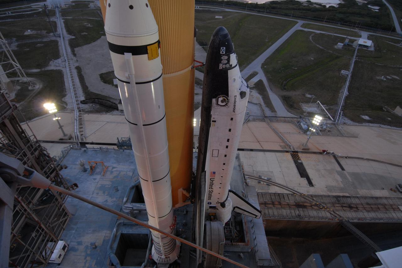 CAPE CANAVERAL, Fla. – Dawn's early light reveals space shuttle Endeavour secure on Launch Pad 39B at NASA's Kennedy Space Center in Florida.   First motion of the rollout from the Vehicle Assembly Building was at 11:57 p.m. EDT April 16. Endeavour will be prepared on the pad for liftoff in the unlikely event that a rescue mission is necessary following space shuttle Atlantis' launch on the STS-125 mission to service NASA's  Hubble Space Telescope. After Atlantis is cleared to land, Endeavour will move to Launch Pad 39A for its upcoming STS-127 mission to the International Space Station, targeted to launch June 13.   Photo credit: NASA/Jack Pfaller