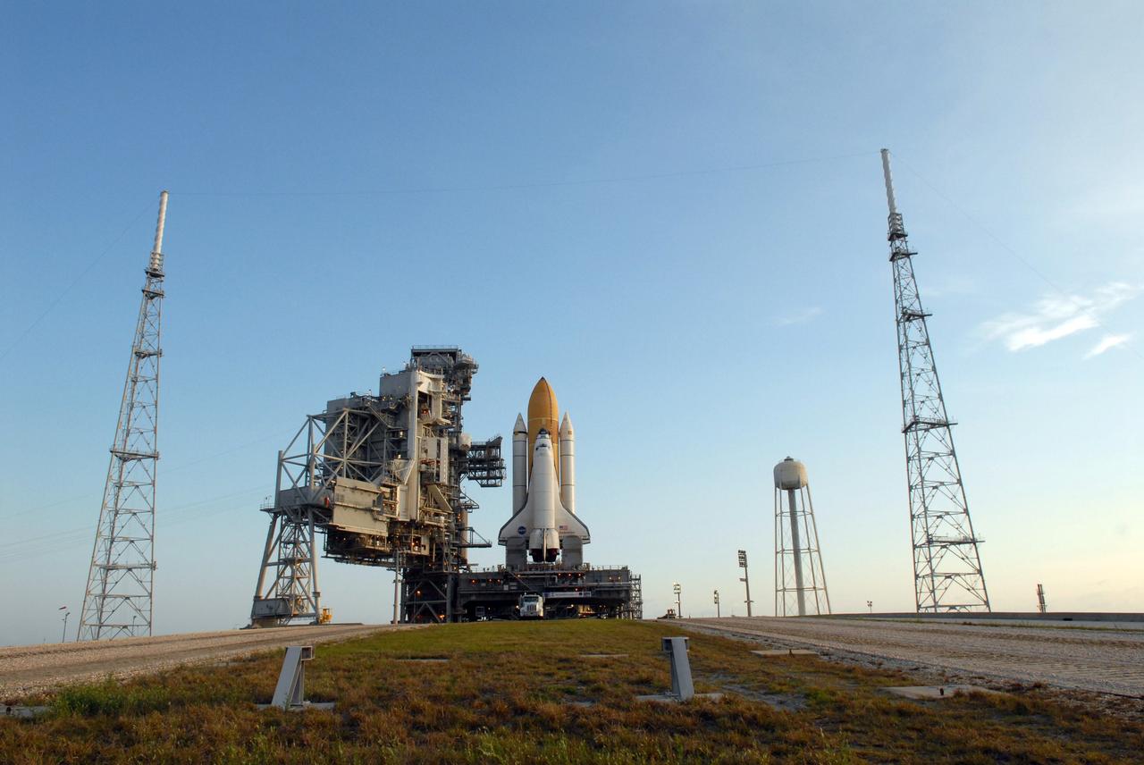 CAPE CANAVERAL, Fla. – Space shuttle Endeavour stands tall and proud on Launch Pad 39B at NASA's Kennedy Space Center in Florida. First motion of Endeavour's rollout from the Vehicle Assembly Building was at 11:57 p.m. EDT April 16. Surrounding the pad (seen left and right) are the new lightning towers erected for NASA's Constellation Program, which will use the pad for Ares rocket launches. Endeavour will be prepared on the pad for liftoff in the unlikely event that a rescue mission is necessary following space shuttle Atlantis' launch on the STS-125 mission to service NASA's Hubble Space Telescope. After Atlantis is cleared to land, Endeavour will move to Launch Pad 39A for its upcoming STS-127 mission to the International Space Station, targeted to launch June 13. Photo credit: NASA/Jack Pfaller